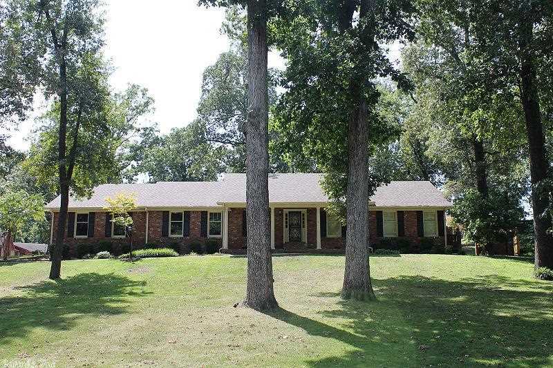 Lovely 3 bedroom/2bath brick home with guest house!  This home has curb appeal from the large tree shaded lot to the large front porch with columns.  Interior features (2) living areas as well as a separate dining room and breakfast nook.  There is also a small basement room that could provide additional space if needed. Exterior has guest house in back with 3/4 bath and living/bedroom area.  This home needs TLC to restore to its original beauty and has some pretty features! Priced to sell and sold "AS IS".
