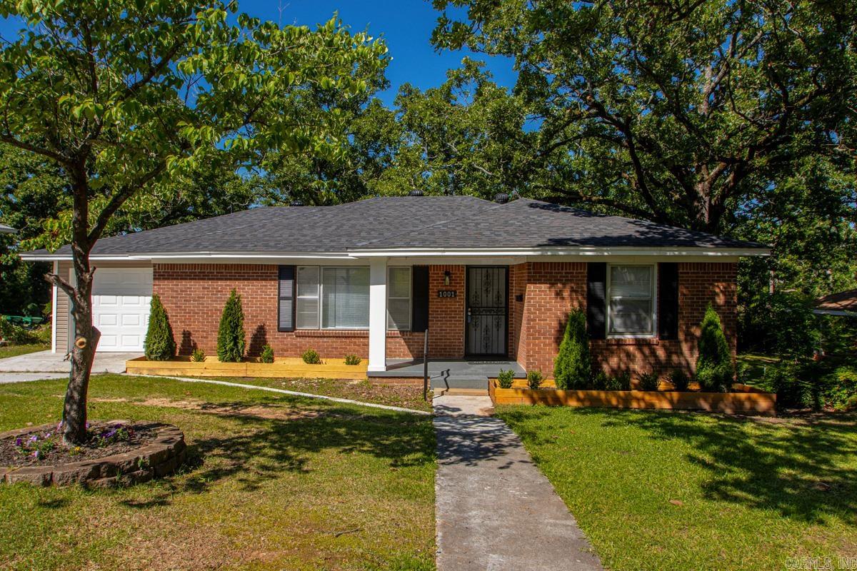 Beautifully remodeled 3-bed, 2.5-bath home in the heart of Historic Park Hill! This move-in ready property blends classic charm with modern updates throughout. The layout features a bright living area, updated kitchen with quartz countertops, and a private primary suite with a full ensuite bath for added comfort and convenience.  Recent improvements include a new roof, giving peace of mind for years to come. The lower level adds flexibility with a bonus room, half bath, and a dedicated shop space—ideal for hobbies, projects, or extra storage. Step outside to enjoy a large, shaded, fully fenced backyard - perfect for relaxing, entertaining, or pets. The oversized deck offers plenty of space for outdoor dining and gatherings.