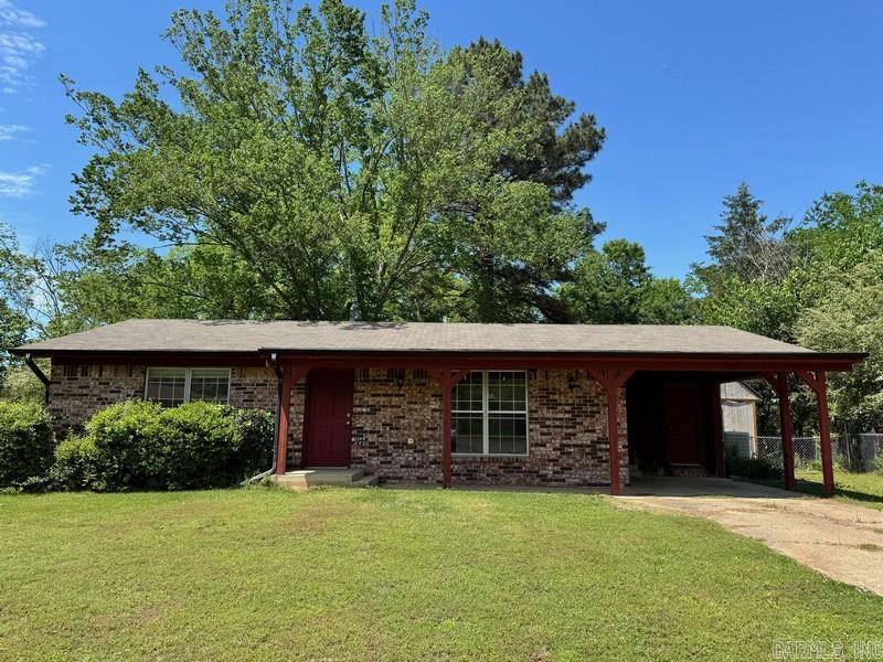Affordable one-story brick traditional style home conveniently located within the Lake Hamilton School District and in close proximity to National Park College. Home features 2-bedrooms, 1-bathroom, central heat, central air, attached one car carport, carport storage, open porch, covered patio, level fenced backyard and storage buildings. HUD Case #031-579431, FHA Financing: IE (Insured Escrow). Property is sold in as-is condition, no warranties, guarantees or representations.