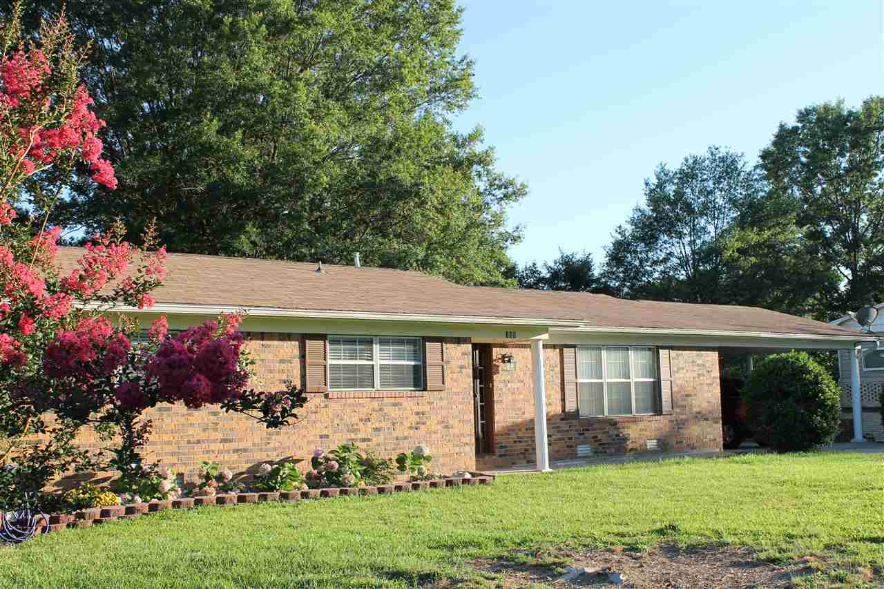 Location! Location! Location! 3/2 brick home close to hospitals, shopping, restaurants. Lower level finished out room with doors to outside covered patio. Lower level workshop area. Updates include: 2012-Roof, 2014- Heat & Air, 2013- Hot water heater, 2013- Laminate flooring, 2016- 2/3 plumbing updated.