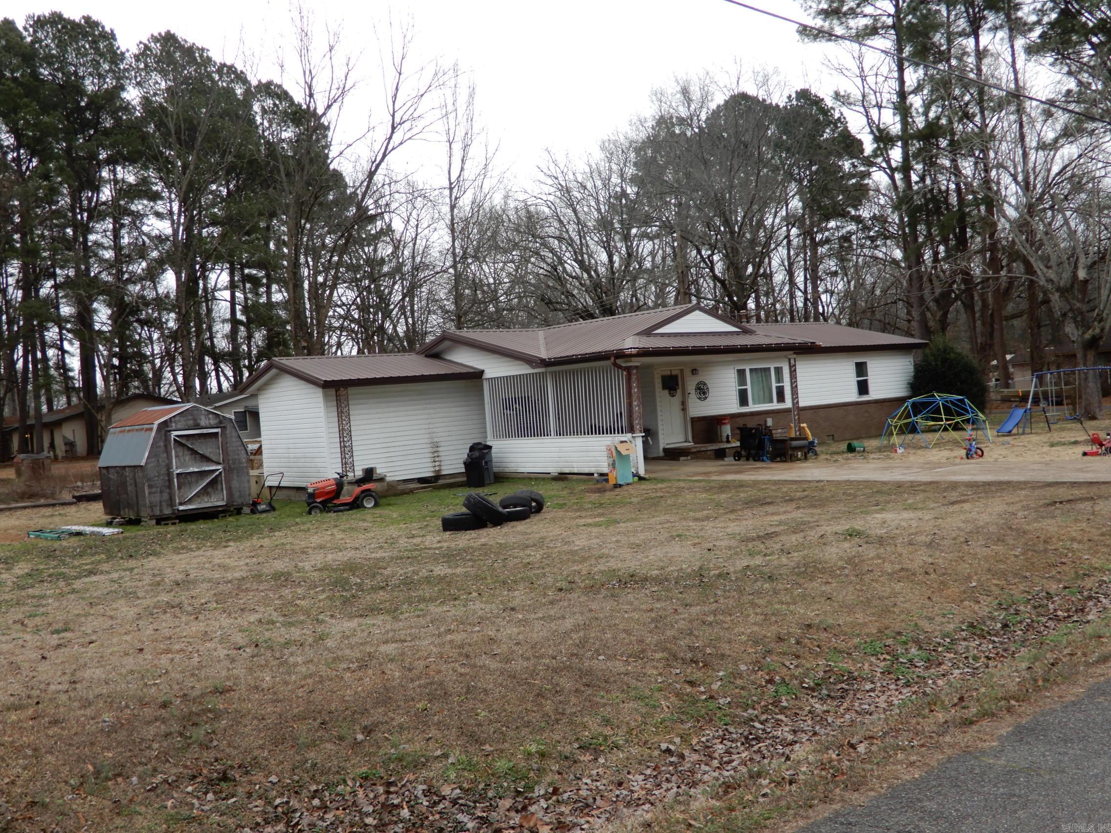 Home has been completely remodeled and updated within the last 3 years, it offers both a large living area and large eat in kitchen and a laundry room large enough that owner currently has a small salon in it. located in a quiet neighborhood just a few miles from Searcy's shopping area.