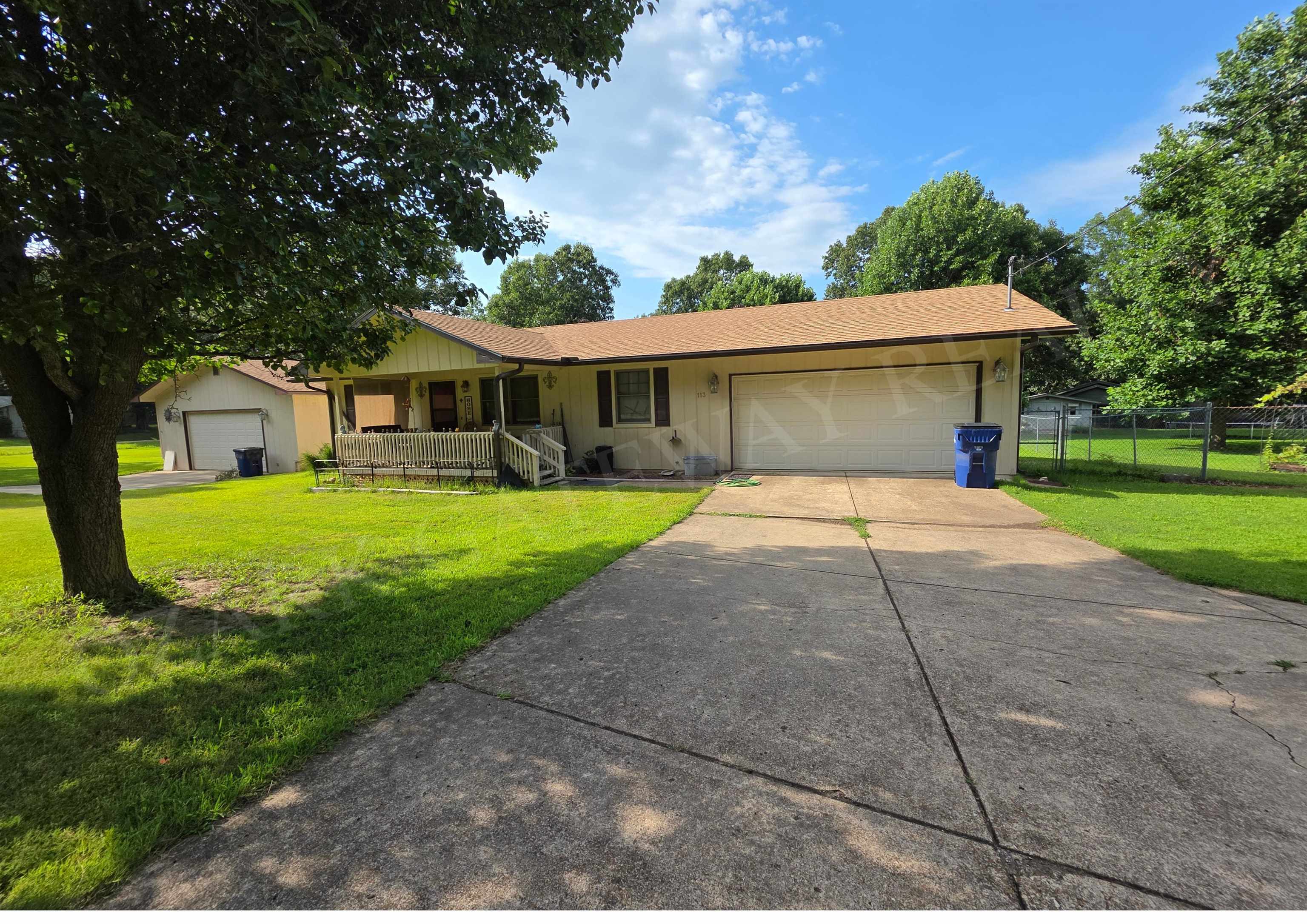 Looking for space, convenience, and plenty of room for all your hobbies? This well-maintained home sits on three level lots and offers a combination that's hard to find. With an attached two-car garage and an additional detached three-car garage, you'll have abundant space for vehicles, a workshop, storage, or recreational equipment. Inside, you'll find attractive hardwood floors and tile, along with nice-sized rooms that provide comfort and flexibility for everyday living. The kitchen comes complete with all appliances, making your move that much easier. Step outside to enjoy the large, level backyard, fully fenced for pets, play, or entertaining. There are two sheds for your storage needs. An included walk-in tub, currently in the garage, offers a valuable option for anyone planning for future accessibility or a bathroom upgrade. Whether you're looking for extra garage space, a move-in ready home, or a property with room to spread out, this one checks all the boxes. Schedule your showing today and come see everything this property has to offer! Inside photos coming soon!