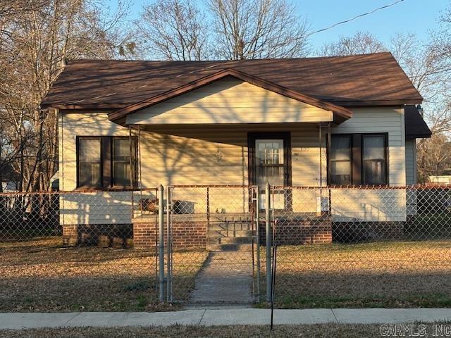 Four bedrooms, two baths, eat-in kitchen, living room, laundry area and single carport.  Fully fenced yard on corner of West 7th and Lisbon Road, Smackover, AR.