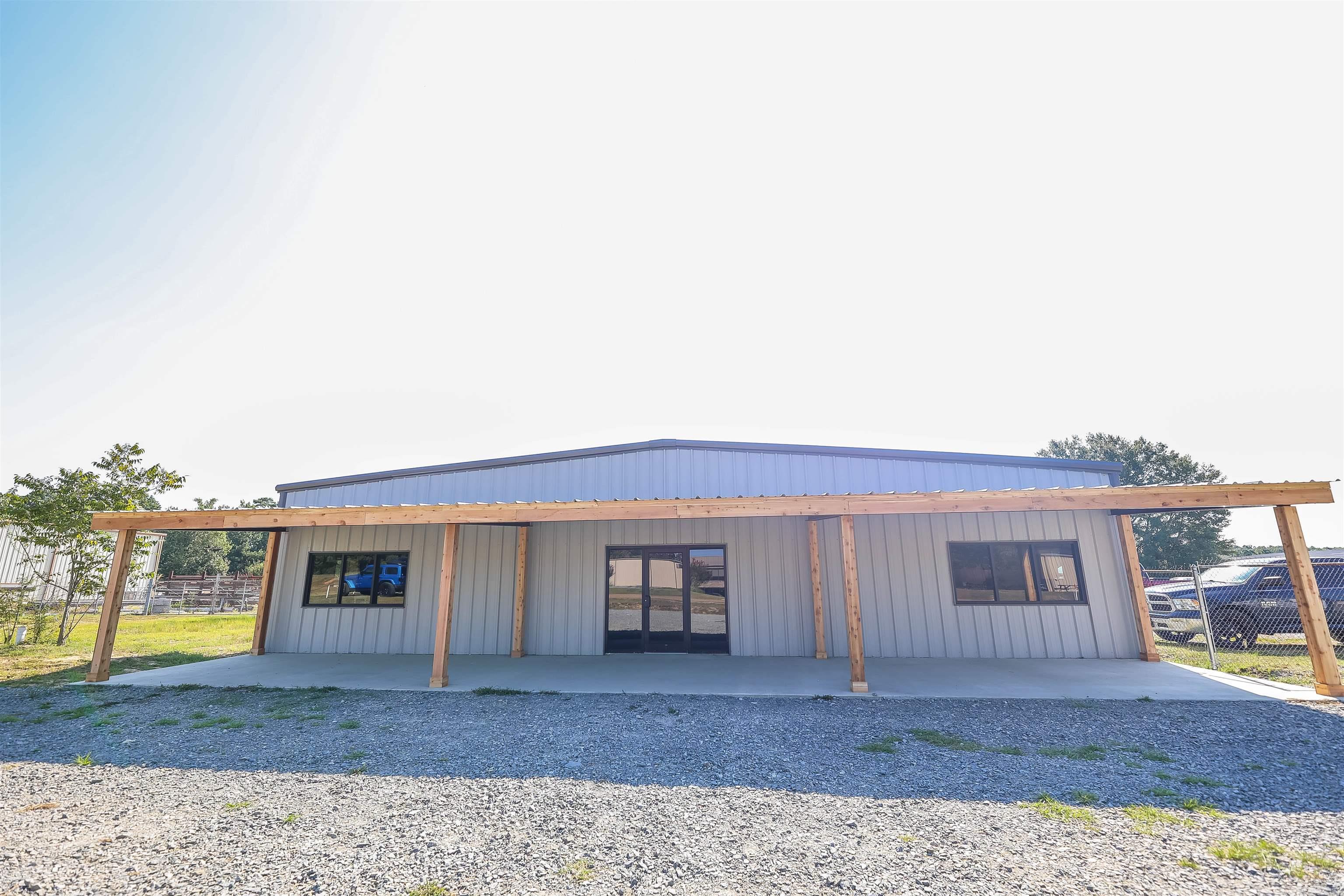 A move-in-ready gem! This property boasts 11 spacious offices, a secure safe room, a versatile multipurpose area, and a grand conference room, perfect for your business needs. Situated on 3.5 acres nestled off the industrial road, this location offers both convenience and space. Don’t miss out on this incredible opportunity for your business.   The current owner is offering a one-year lease to any prospective investor interested in this property.   Total square footage includes: 6387 sq. ft. H/C office* 8065 sq. ft. heated warehouse with upstairs storage and office* 1000 sq. ft. commercial paint booth** 2640 sq. ft. H/C shop**  *Taken from Builder's Floor Plan **Taken from Assessor's Records.
