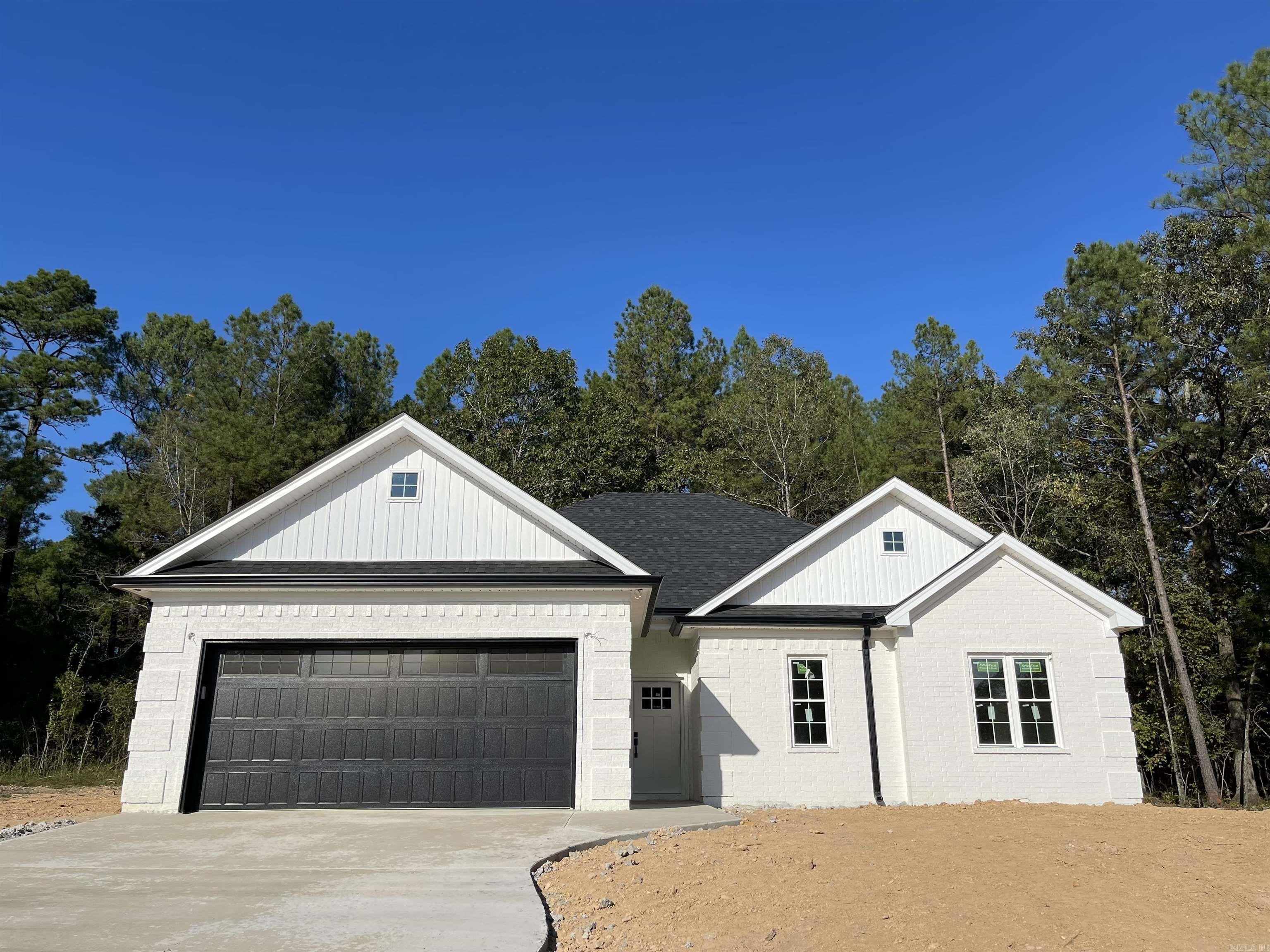 New Construction in Fountain Lake School District. Three bedrooms and Two bathrooms on approximately 1 acre lot. This home features quartz countertops and luxury vinyl flooring. Open floor plan with eat in kitchen and island for bar stools. Crown molding, stainless steel appliances and custom touches throughout.  Beautiful, modern colors were selected for this home. (Alabaster walls, High Reflective White cabinets/trim,Tricorn Black island.) The new bypass gives quick easy access to everything. (Annual taxes were for lot only.) Estimated completion first week in November.   Welcome Home!