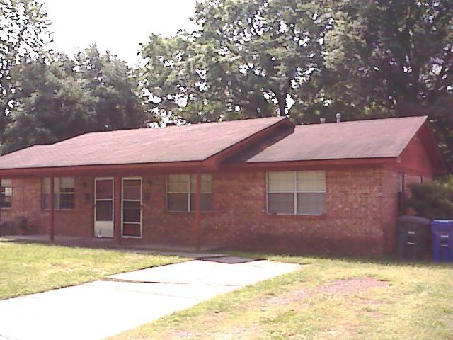 Investors dream! Brick duplex in a great location. New AC, outside shed, privacy fencing, outside shed and a metal building.  Lots of living space.  Call for showing.