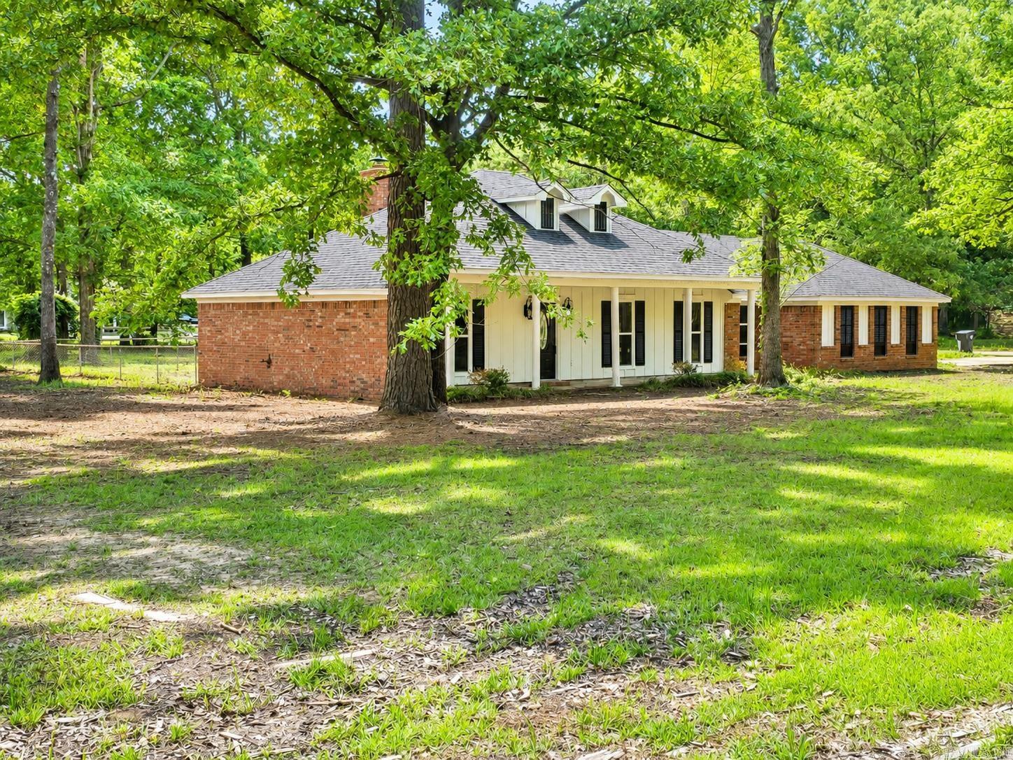 Completely remodeled 3BR/2BA traditional ranch-style home situated on approximately 1 acre in one of Pine Bluff’s premier neighborhoods! This rare find offers quality updates throughout including new HVAC, all new windows and doors, new lighting, new LVP flooring, fully remodeled bathrooms, quartz countertops, and brand-new stainless steel appliances. The spacious layout features a large living area, updated kitchen, and excellent natural light throughout the home. Outside you’ll find a two-car garage, fenced backyard, storage shed, and desirable corner lot location with plenty of room to enjoy. Seller is also providing a 1-year home warranty through Choice Home Warranty, termite clearance letter, and new survey for added peace of mind. Move-in ready with modern finishes and timeless ranch-style appeal!  SOME IMAGES VIRTUALLY STAGED
