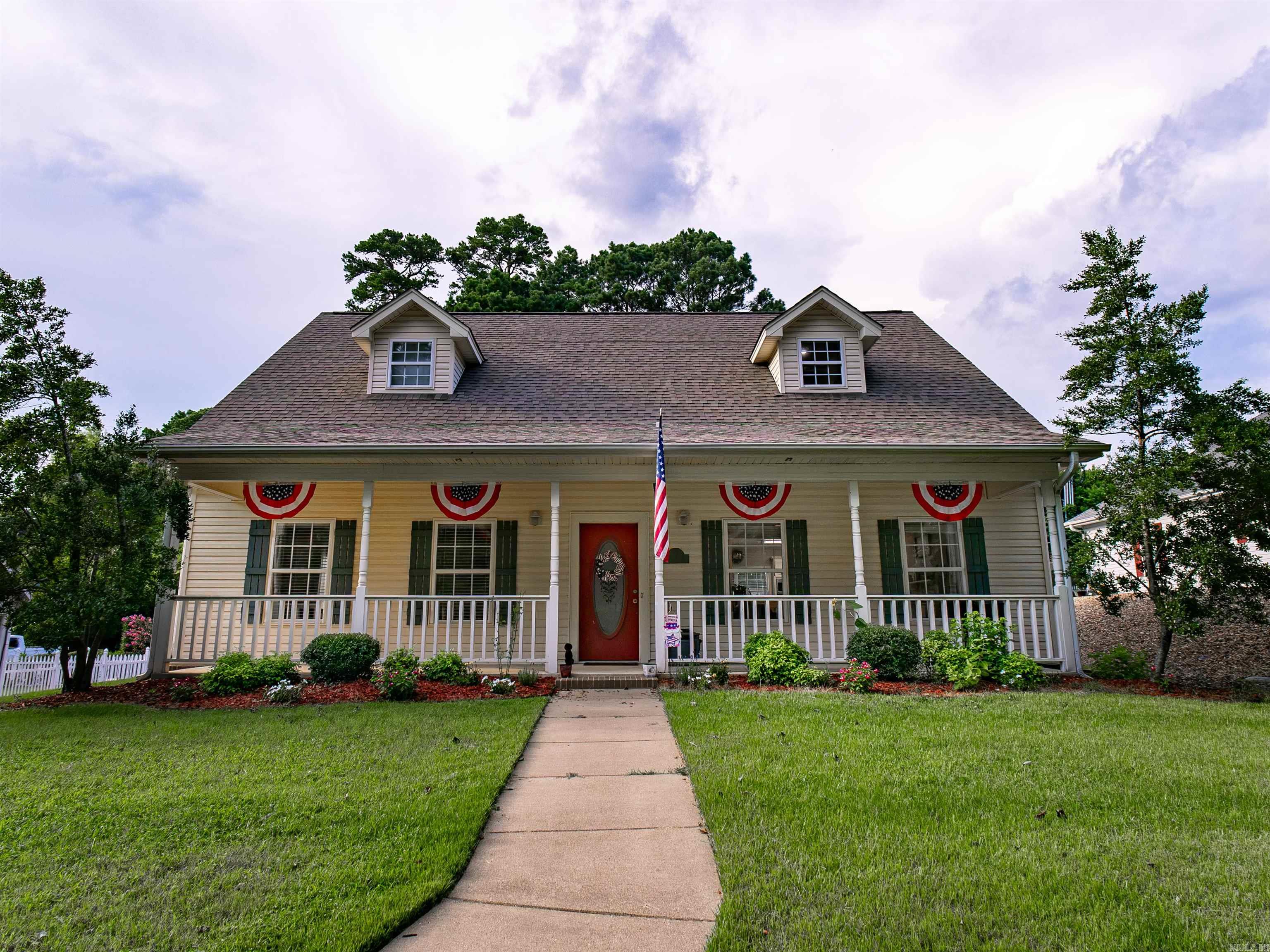 Move-in ready and packed with space, this beautifully maintained 3-bedrom, 2.5 bath home offers 2,432 sq ft of comfortable living in a quiet, established neighborhood!  It is conveniently located minutes from shopping, schools and all the amenities of town. The spacious floor plan features a large living area, oversized laundry room and pantry with plenty of storage.  The master bedroom with large closet and bathroom is located downstairs. Upstairs, two bedrooms share a convenient Jack-and-Jill bathroom and an abundance of closet and storage space throughout. Outside, the double carport provides rear access to the home. The above ground garden beds and patio setting provide a great outdoor space as well.  Call today for a showing!