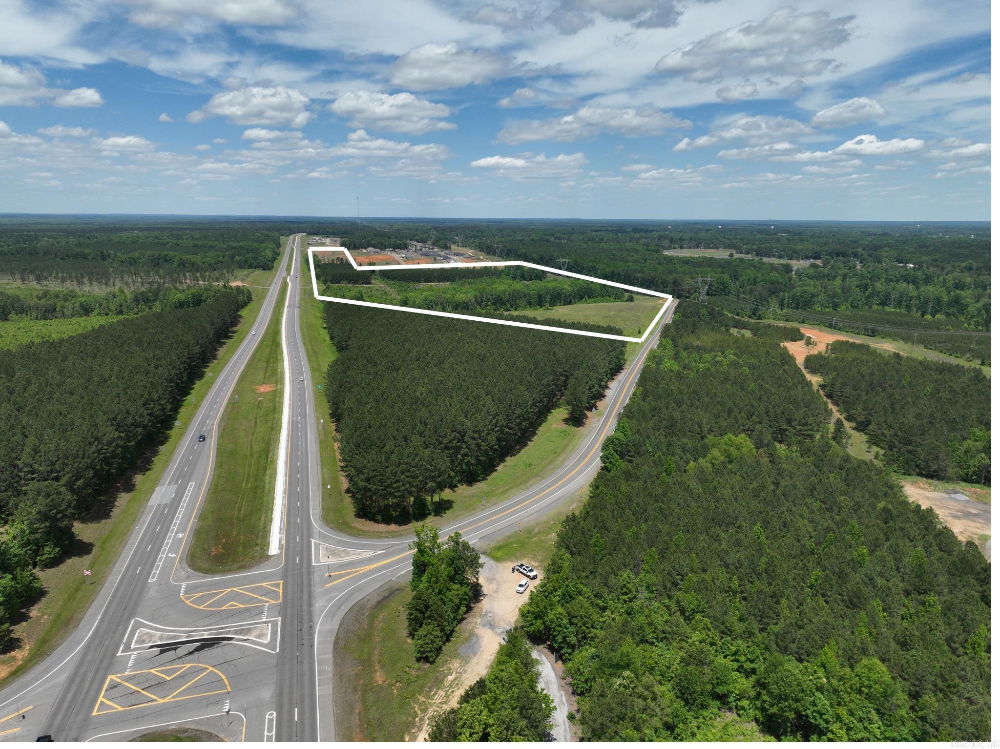 71.18± acres of commercial land available in Sheridan, Arkansas along the high-traffic US-167 corridor. This expansive tract offers significant development potential in a growing market with nearby retail, residential subdivisions, and ongoing area expansion. The property is well suited for large-scale commercial, mixed-use, or investment development opportunities. Its size, location, and accessibility make it a rare offering in the Sheridan submarket.