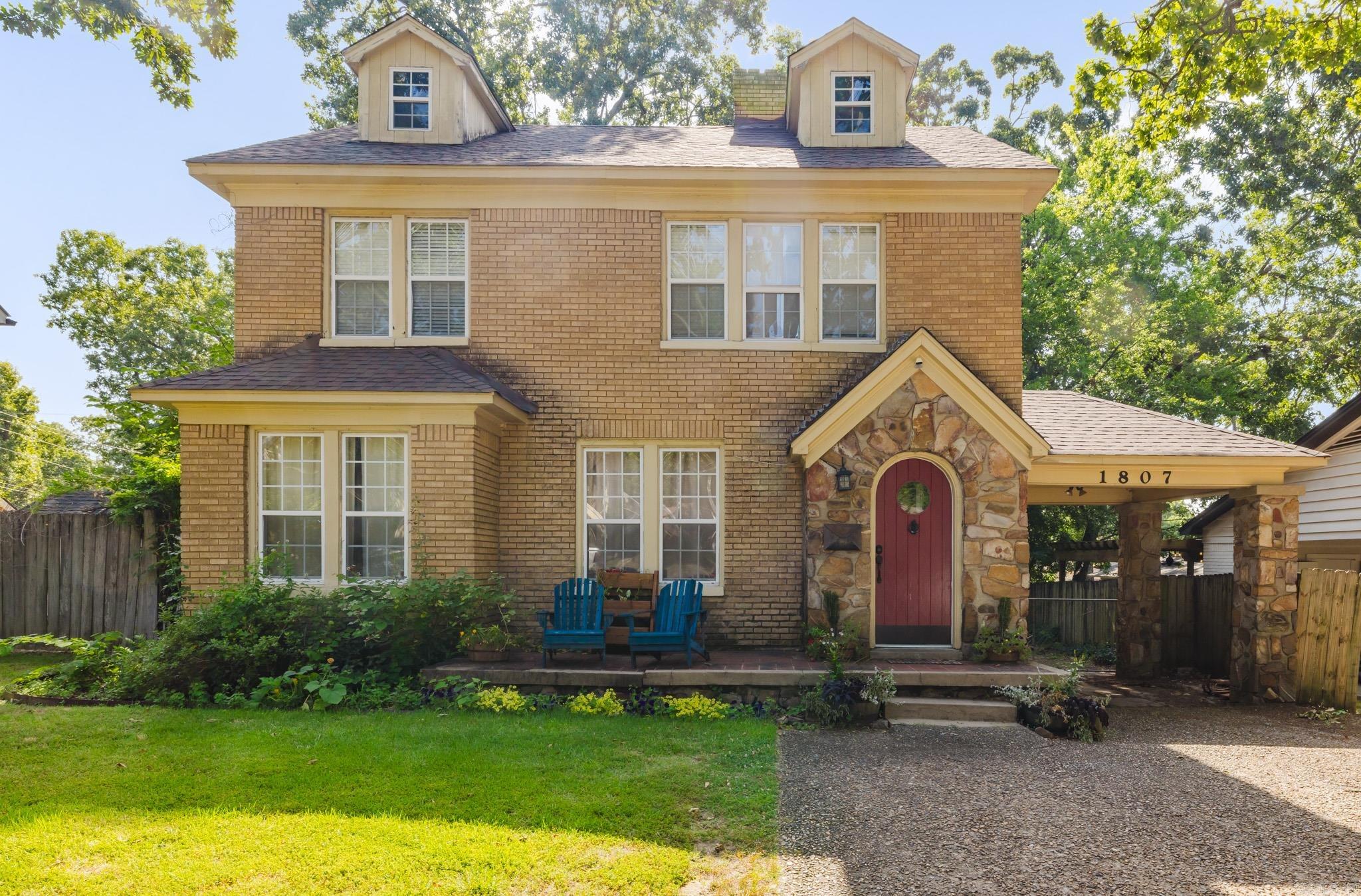 This is your opportunity to own a historic home in the heart of Little Rock without the Hillcrest pricetag. Roof fully replaced May 2026! Structural engineer approval with documentation May 2026! Less than a minute from I-630, two minutes from UALR, three minutes from UAMS, and five minutes from Downtown Little Rock, this 2 story, spacious home was built nearly a hundred years ago (1929), and has been well-maintained while keeping its charm intact. Gorgeous hardwood floors throughout the home. Large office space on first floor that could be used as a studio, office, play-room, band room, or extra bedroom. Detached two car garage and covered carport area as well as a spacious driveway provide for ample parking. For the buyer who appreciates the beauty of historic architecture. Priced less than comps in the area per square foot!