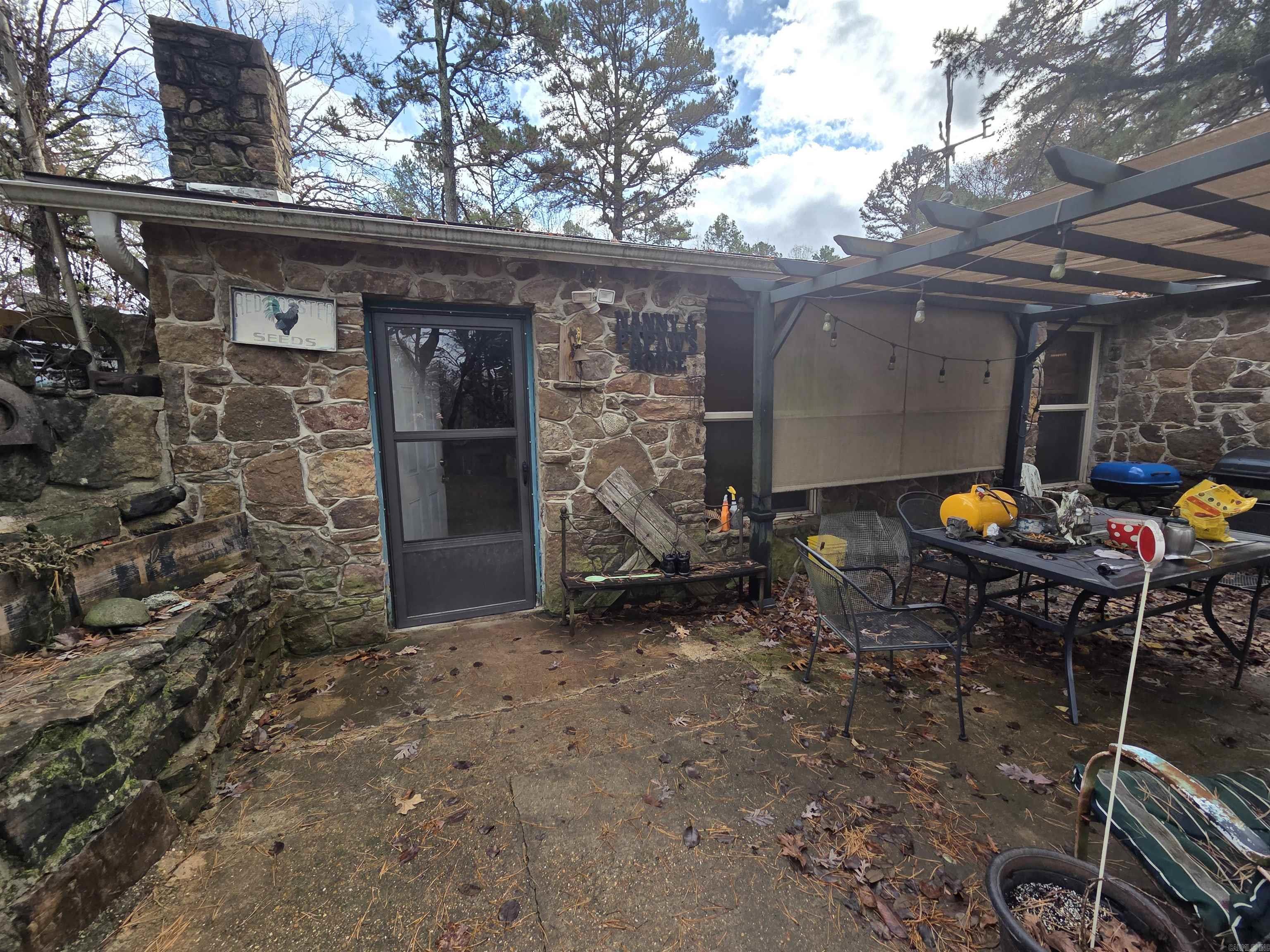 If you like underground homes, here's just the one for you. 3 bd, 2 bath home with a western feel. The bedrooms are large, 1 is a master suite with a large walk in closet. There is a laundry room.  A roomy 2.75 acres for you to have a garden, and chickens for the chicken coop and a dog pen. The back yard has a 5 ft fence around it with 2 gates. There are 2 small older 8x10 outbuildings  and a 18x20 closed in carport with a concrete floor and another 18x20 building with power. Plenty of space to store your tools and toys and a large front yard for the kids to play in. This home is being sold "AS IS".