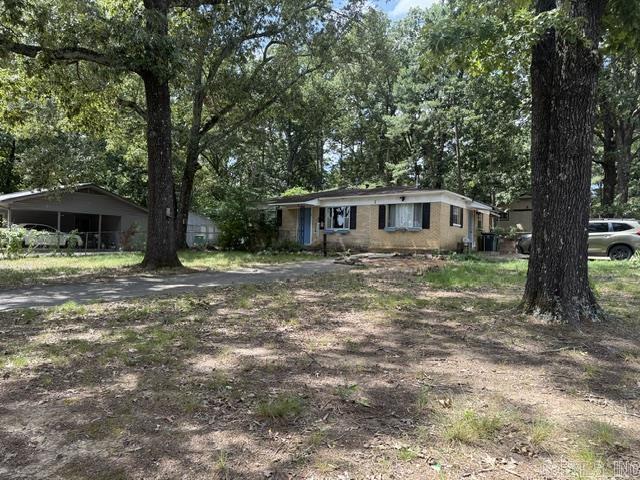 All brick on quiet street, large corner lot. Fully fenced backyard with 2 storage bldgs, one with electricity. Many updates inside! Cute kitchen, new stainless gas range, new stainless refrigerator conveys. Big laundry room with tons of storage. Updated bathroom. New tankless water heater (2024), newer HVAC (2020) and electrical service panel and GFCI's installed (2019). See agent remarks.