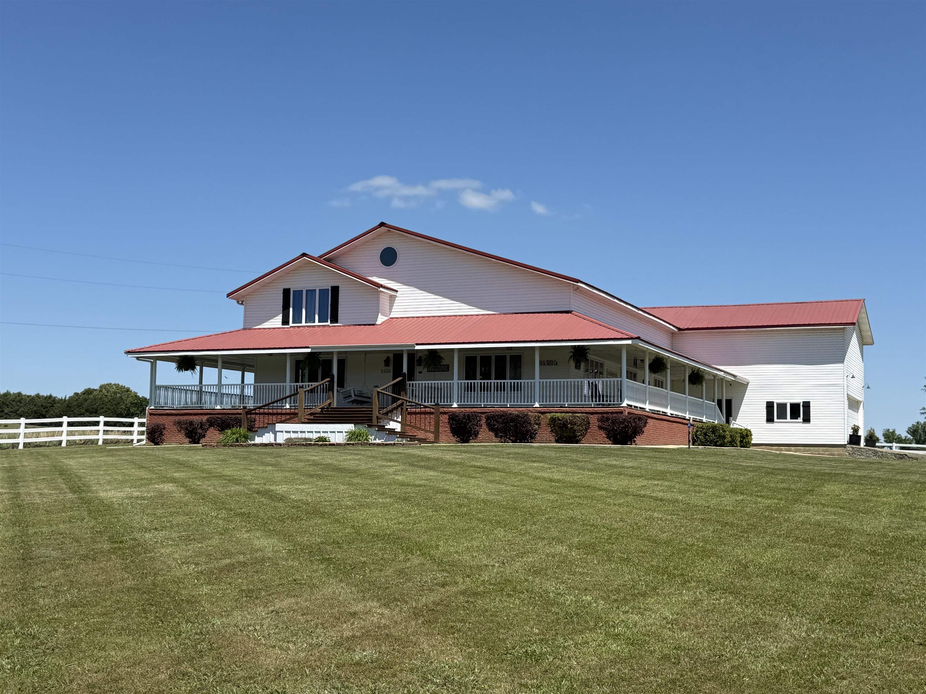 This stunning four bedroom, three bath two story property offers the perfect blend of comfortable living and business potential. Originally built as a private home, it has recently operated as a successful event venue hosting weddings, family gatherings, Airbnb guests, and even serving as a duck lodge.  Situated on 2.1 peaceful acres with approximately 4,000 square feet, the home features vaulted ceilings, hardwood floors, large windows and a spacious open layout filled with natural light. The main level includes two oversized bedrooms, a large bath, guest bath, oversized living area, and spacious dining area open to the kitchen with coffee counter. Upstairs offers two oversized bedrooms, a full bath, and generous storage space.  Outside features include a wraparound porch, 13x27 screened entertainment area, storage space, white fencing, large two car garage, and two central heat and air units.  Located near Lake Charles, Spring River and Black River. Contents may also be purchased as a package deal.