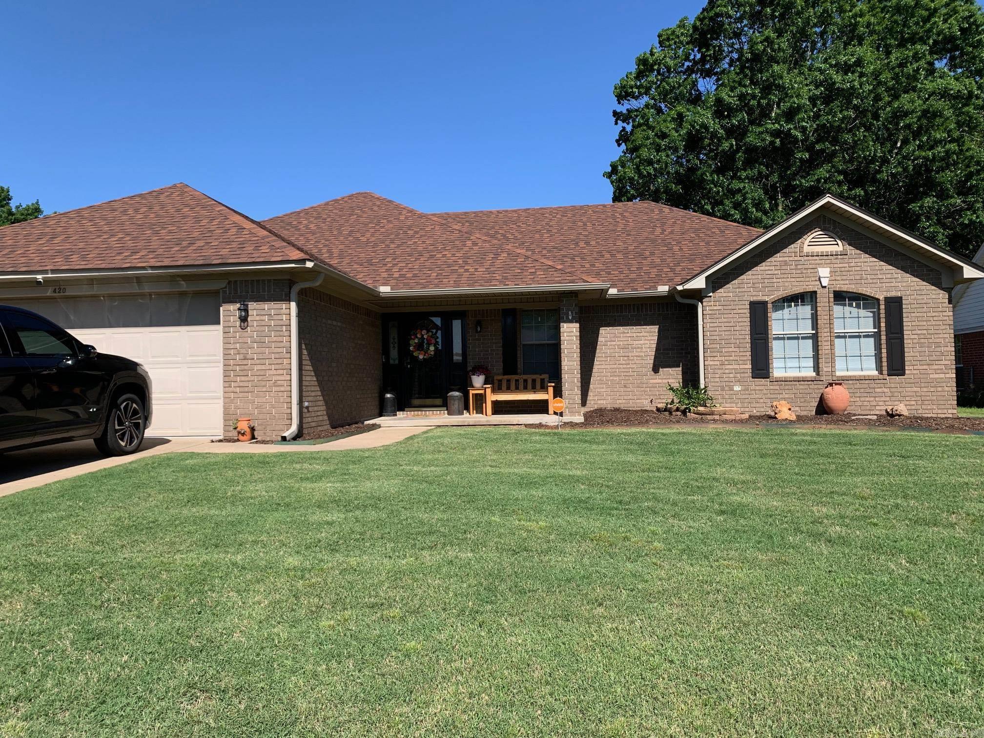 LBX. Can be shown anytime--call Reda at 501-450-0903. House has been completely updated and remodeled. Big corner lot with work shop and shop addition. Has large walk-in shower in master bath, counter tops are new and has new kitchen sink with gourmet faucet. Corner fireplace in living room. Window blinds stay, wall mounted TV's do not stay with house. Nice screened-in patio and immaculate lawn.