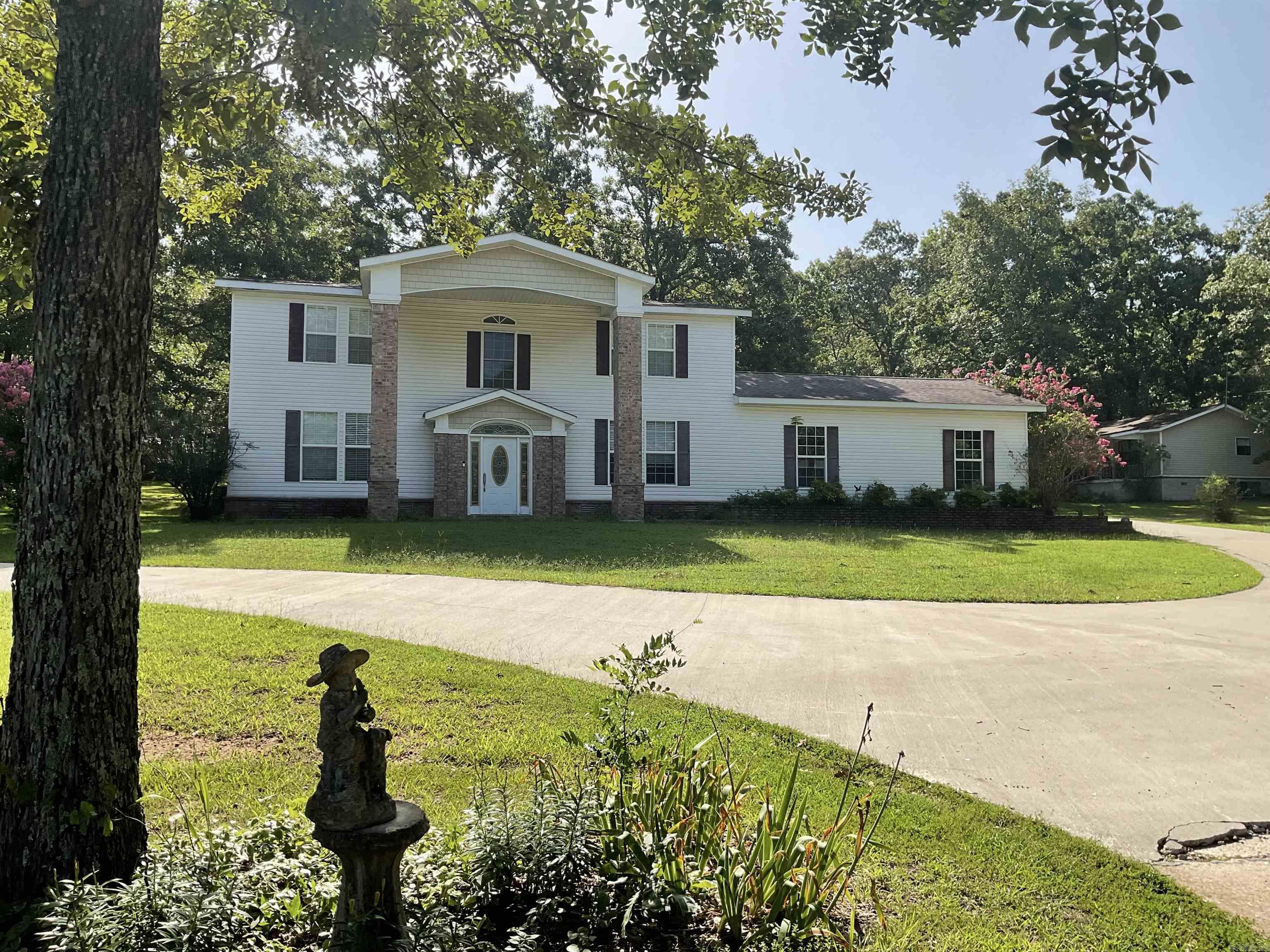 Main home 3BR/1&1/2BA, 2446sf, (would make a great bed & breakfast) with 6 rental units on the 3+ acres plus room for more.  Two of the rentals are 3BR's, 4 are 2Br's.  All rentals are fully occupied with renters who have been there from 5 to 15 years.  36x48 shop fully insulated with elec, doors.  Seller's income & expense books to be open for serious buyers. Sitting on the edge of town this great location is just a few minutes from boat launching ramp, parks, restaurants & all stores.  There is a huge need for rentals in the area is the reason they stay rented.  All homes and property are neat, clean and well taken care of.