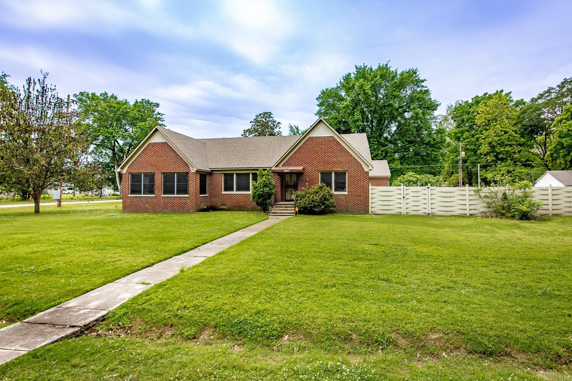 This is a wonderful house with all of the extras.  New Roof, Completely new heat & air unit only 2 years old, Saltwater pool, Privacy fence, whole house Generator, Storm Cellar in the garage, New Windows, Sunroom is heated and cooled, Main Bathroom Remodeled.  Come look and see.  I think you will fall in love with it.  Open pool photos added.