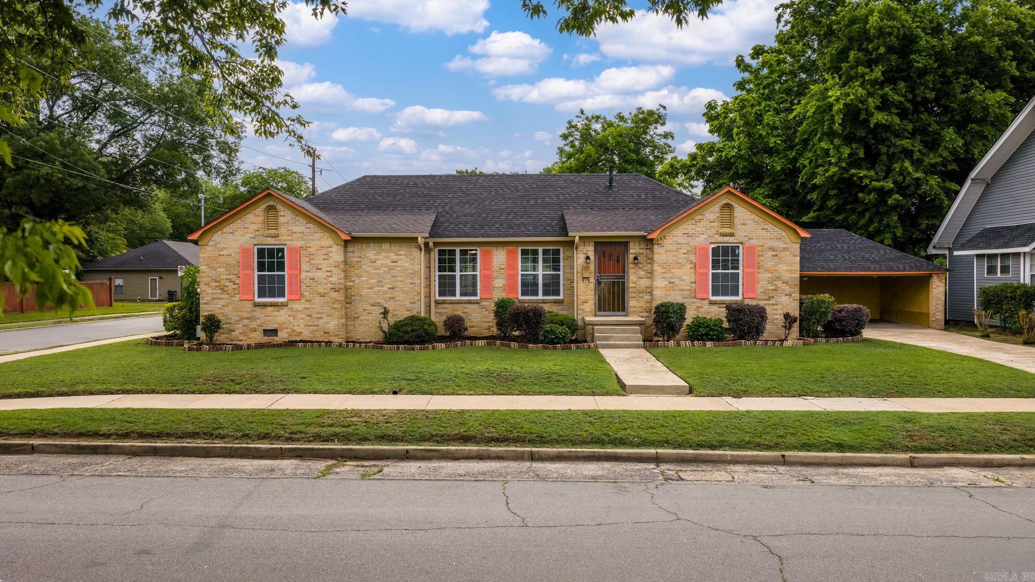 Welcome home to this beautifully renovated 4-bedroom, 2-bathroom residence offering 1,790 square feet of stylish, move-in-ready living space. Situated on a generous corner lot, this home combines modern updates with everyday comfort—all just minutes from downtown Little Rock. Step inside to discover luxury vinyl plank flooring flowing throughout the home, creating a seamless and contemporary feel. The updated kitchen features gorgeous granite countertops, a gas range, and a convenient breakfast bar—perfect for morning coffee, casual meals, or gathering with family and friends. The spacious primary suite includes a large walk-in closet, while the thoughtfully designed floor plan provides plenty of room for both relaxation and entertaining. Outside, the oversized corner lot offers additional space to enjoy, garden, play, or simply unwind.