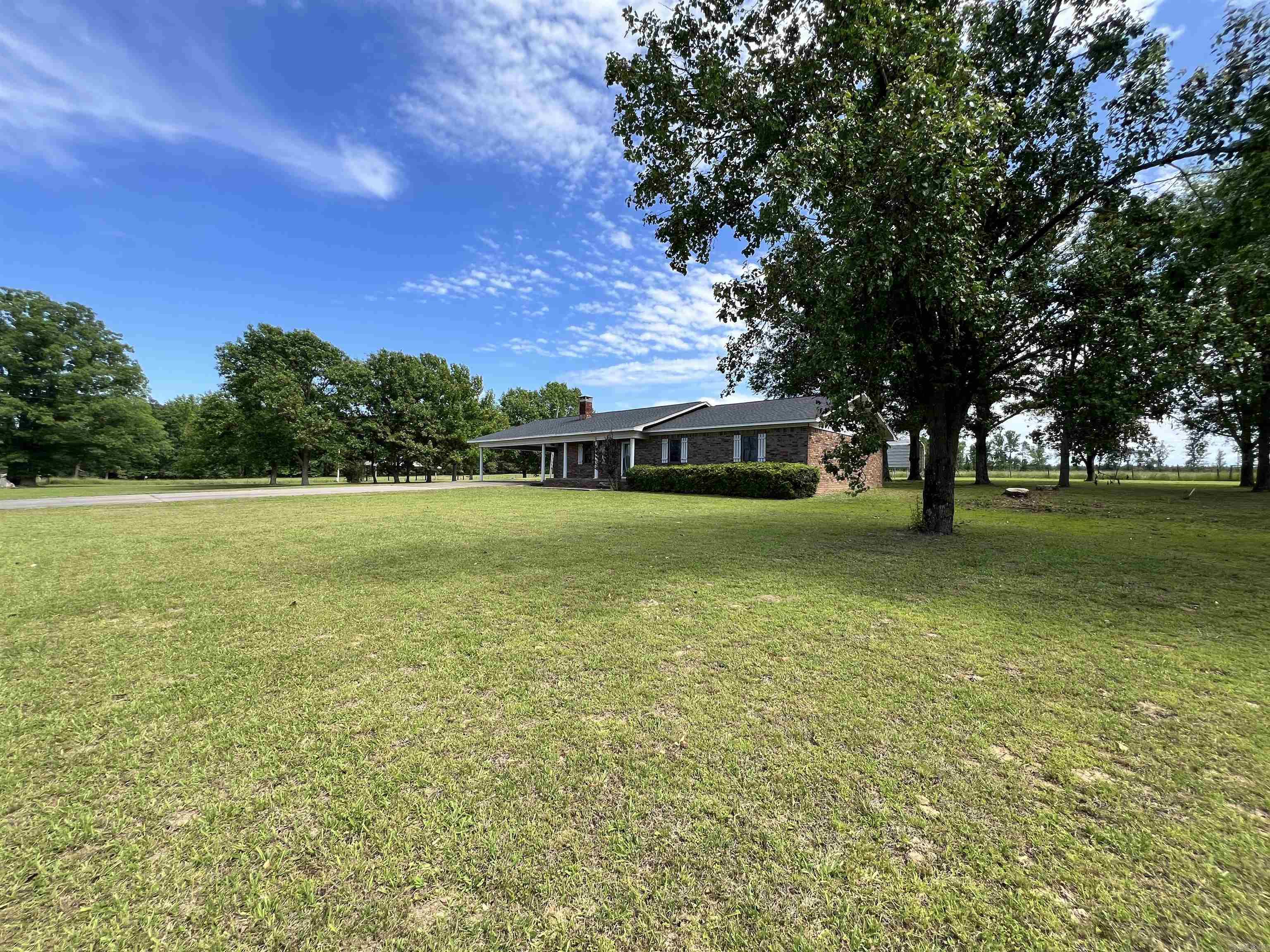 This the property everyone is looking for! Large home sitting on 48 acres with pasture and pond. This spacious 2000 sq ft home offers 3 bedrooms, 3 full bathrooms, large kitchen and a den with set up for wood stove. There’s plenty of space for your cars, trucks and atv’s.  A 20x40 shop with electric is perfect for farm equipment, storage or workspace. There are multiple storage buildings and covered spaces to keep all your collectables secure.  Stunning views, privacy and acreage to enjoy with family and friends!