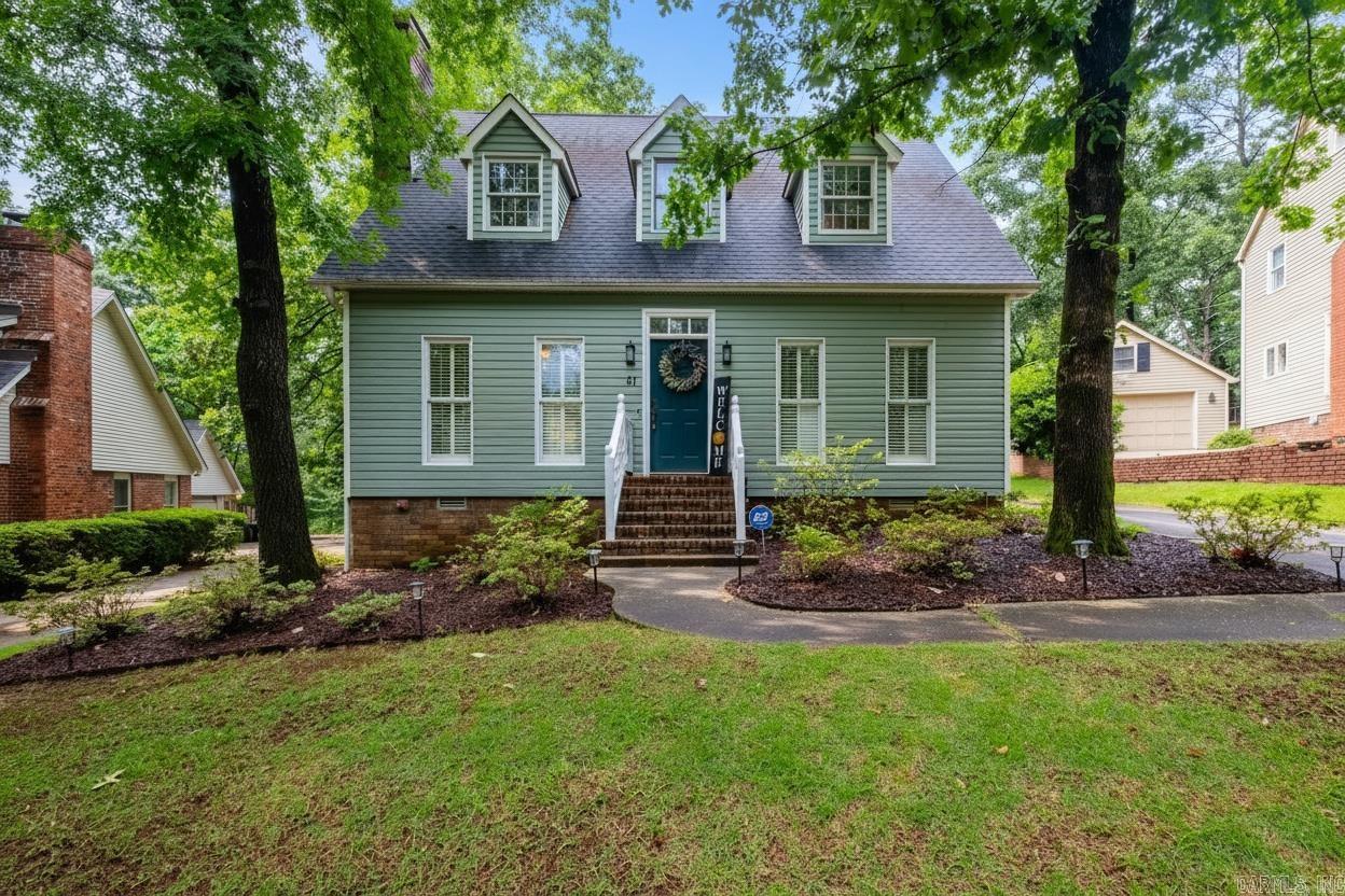 Welcome to Saint Thomas — one of West Little Rock’s most desirable neighborhoods! Located just steps from the neighborhood park and charming gazebo, this beautifully maintained home offers a Primary Suite, flexible office space, and separate dining room downstairs. Upstairs, you'll have room for everyone with 3 additional bedrooms. Beautiful site-finished hardwood floors throughout the main level, quartz countertops, abundant storage space, and plantation shutters provide a functional AND charming feel throughout. Exterior features include exceptional curb appeal, low-maintenance vinyl siding, a covered two-car carport, and a private backyard that backs to green space for added tranquility. Major updates include a newer HVAC unit (2023) and primary bathroom shower. Roof was installed 10 years ago by Oltmans Construction Co. Conveniently located near shops and restaurants, this home is also zoned for Don Roberts Elementary School. Come see!