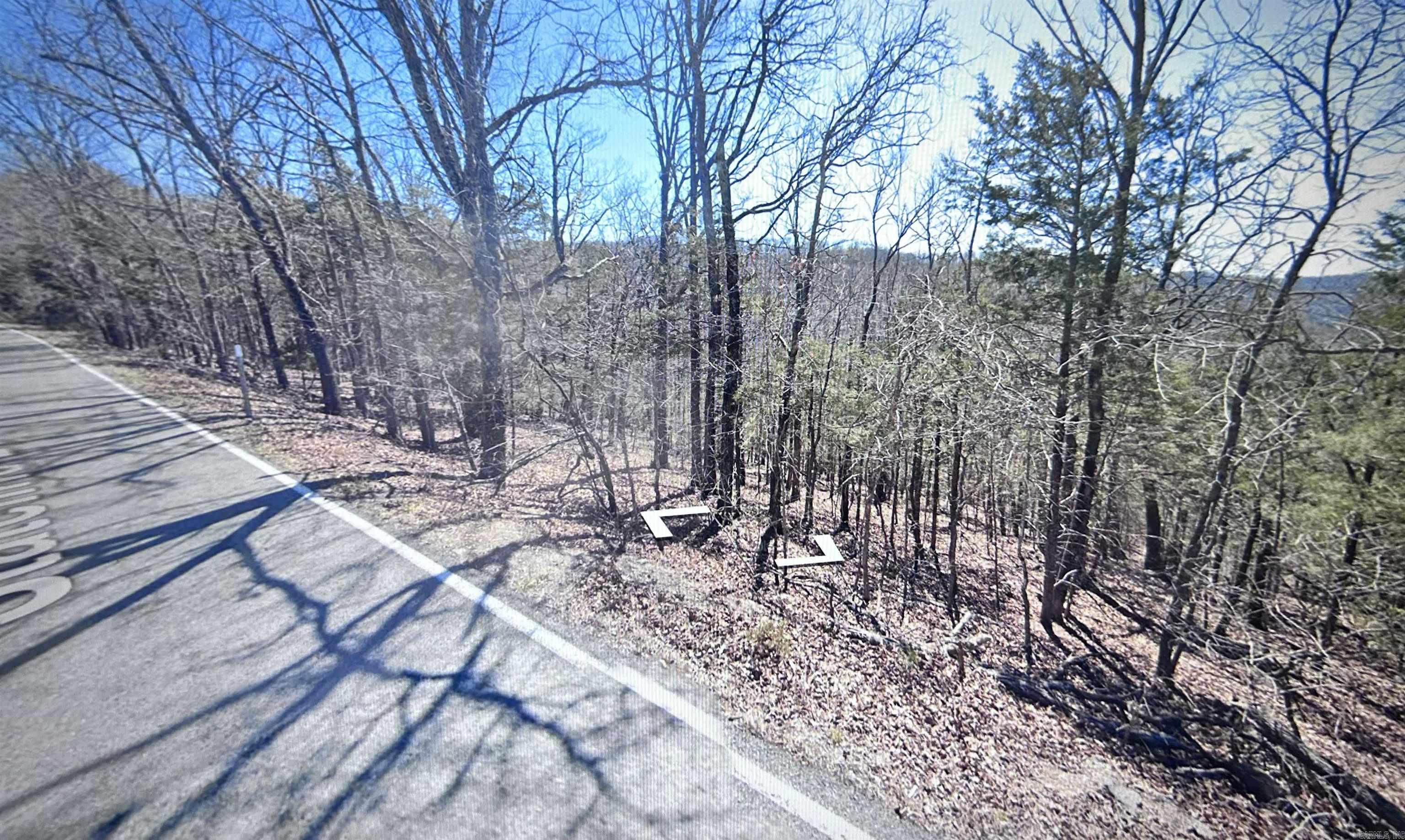 This beautiful lot in Holiday Island is the perfect spot to build your dream home. Located in a quiet and peaceful subdivision, it offers a great view and a relaxing atmosphere that’s hard to find. Whether you're looking for a full-time residence or a weekend getaway, this property gives you the ideal setting to make it your own. Owner financing available. Price of $19,900, DP $2000, monthly payments of $329, for 60 months.