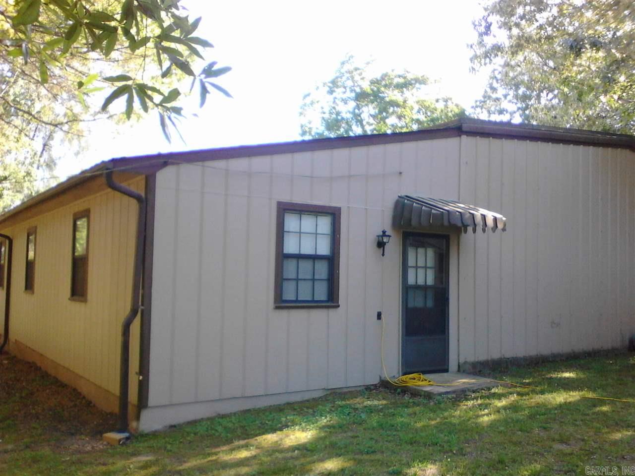 WONDERFUL HOME! HUGE BEAUTIFUL LOT! TOTAL REMODEL A LOT OF EXTRA OUT BUILDINGS FOR STORAGE. 2 KITCHENS  BEAUTIFUL SETTING WITH LOTS OF POTENTIAL AND USES