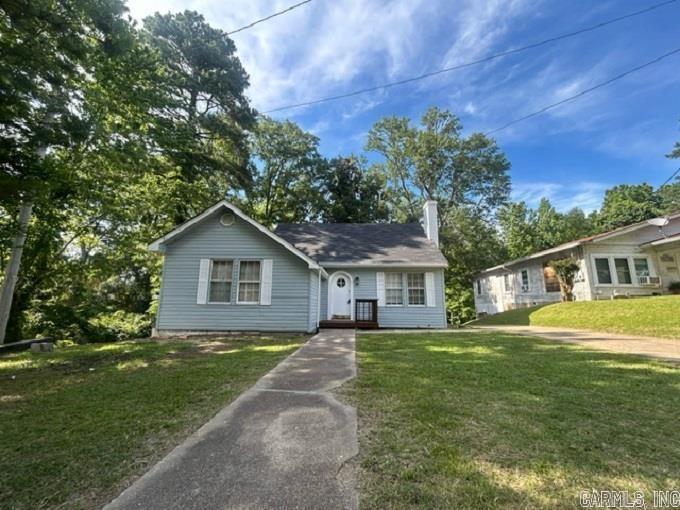 Take a step into this newly remodeled 3 bedroom charmer! This beautiful home has been fully updated to make it your dream home while still leaving the historical charm. On the main floor, there is 1260 square feet of living space including 2 bedrooms, 1 bathroom, a dining room, living room, kitchen and laundry room. Downstairs is a walkout basement with 510 sq feet of a large en-suite bedroom with a mudroom that could be used as a rental, mother-in-law suite or any thing else you need. The house has a new roof, new plumbing, new HVAC, new kitchen cabinets and countertops, new water heater, updated wiring put in just two years ago. If you want a turn key home with the charm of history, this is the one for you. *2 BR upstairs, 1 BR downstairs. Square footage, lot size, and acreage is taken from courthouse records.