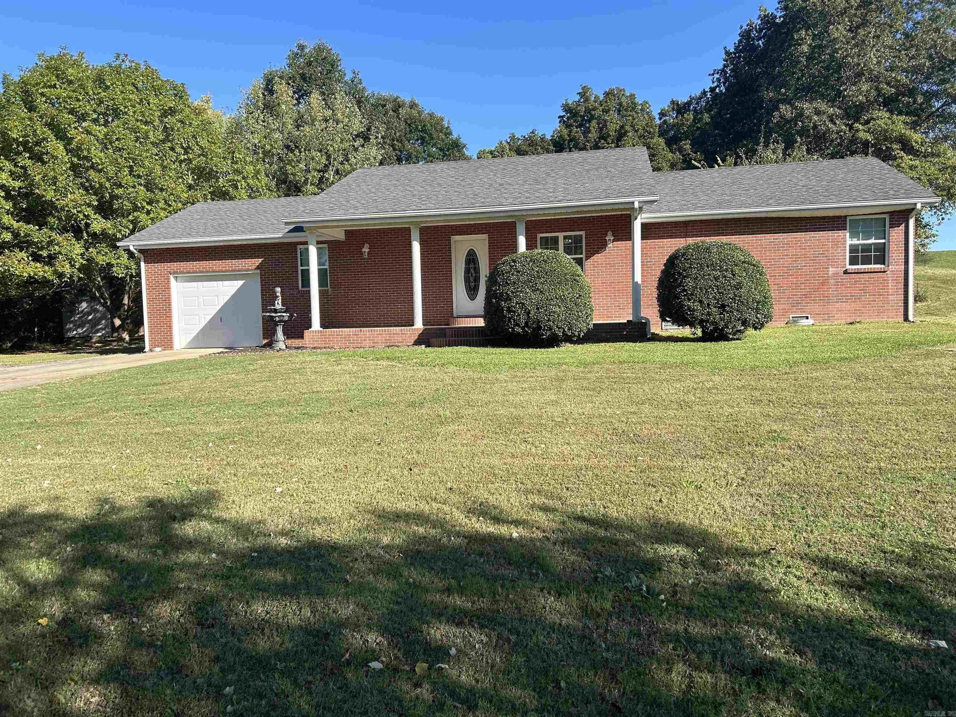 Check out this stunning 3 bedroom, 2 bath home. This home features updated flooring, a gas range, microwave, refrigerator and dishwasher. Inside the one-car garage is an upright deep freezer that also stays with the home. Enjoy your morning coffee on the back deck amongst the variety of wildlife you will catch wondering though the spacious 2-acre yard. Also featured is a large barn with electricity.
