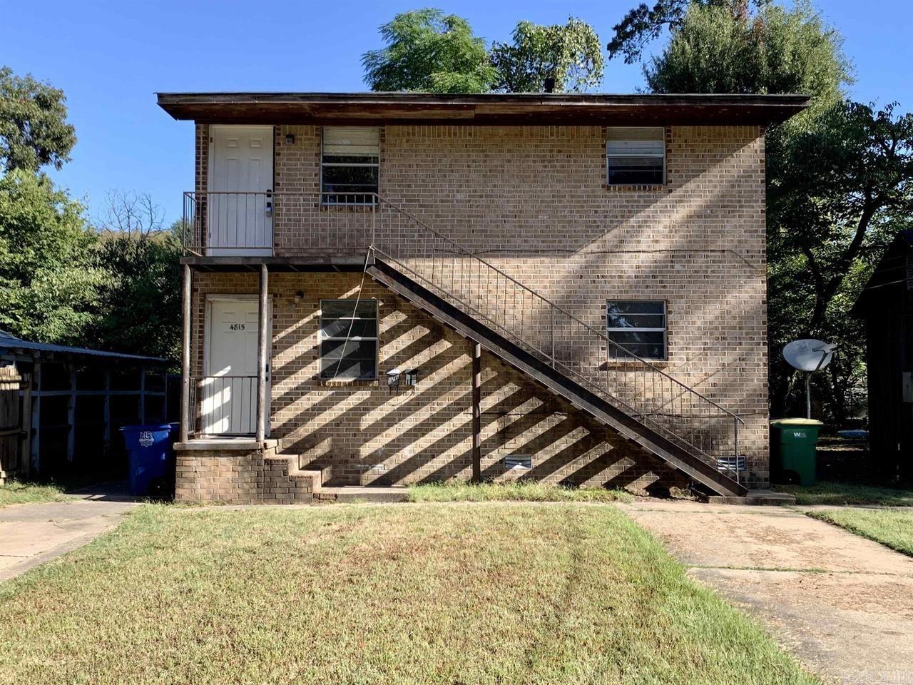 Opportunity meets versatility at 4815–4821 School Street in North Little Rock. This unique property offers a duplex alongside a separate single-family home, creating multiple possibilities under one address. Whether you’re looking to expand a portfolio, live in one unit and utilize the other, or add steady income potential to your holdings, this setup delivers flexibility and function.  Great Investment opportunity!  The duplex, built in the mid-1980s, spans two stories with a combined 1,624 square feet, while the additional single-family residence offers approximately 962 square feet of single-level living with classic charm dating back to 1940. Both structures feature traditional design elements and practical layouts designed for everyday living.  Situated on a combined lot of approximately 0.30 acres, the property provides ample parking and outdoor space. With public utilities and paved road access, convenience is built in.  If you’ve been searching for a property that offers options and long-term potential, this one tells a compelling story all its own.