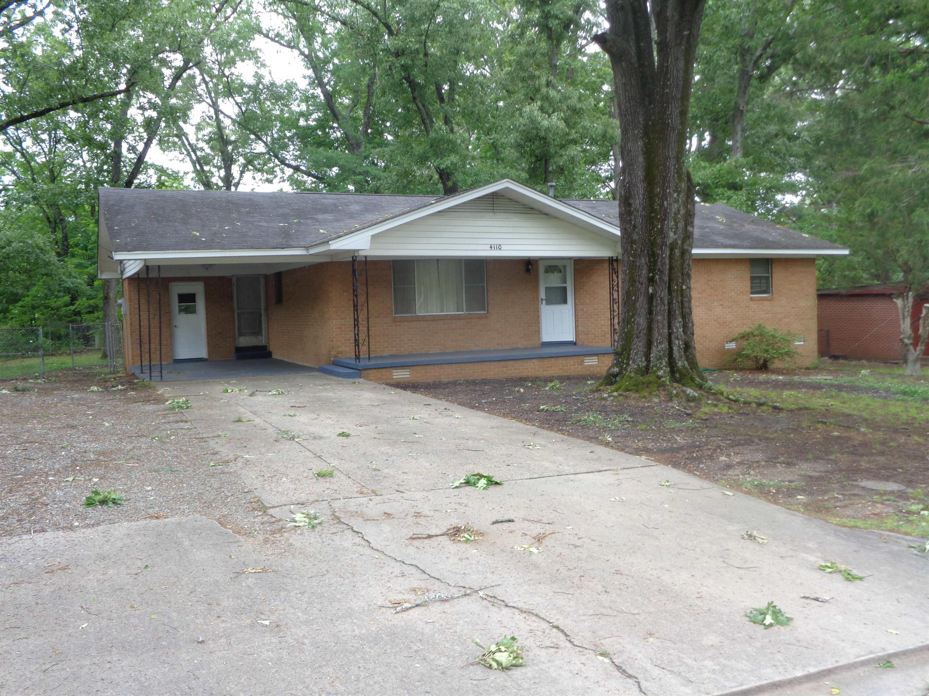 Recently remodeled all brick home located on Two (2) large, fenced lots. The sellers have made this property very nice with the new paint and flooring. You will love the hard wood floors in this 3-bedroom, 2 bath home with a spacious living room, a separate dining room, a cozy den or office area and a laundry room. Plenty of room to park your vehicles and plenty of room to play in the back yard.