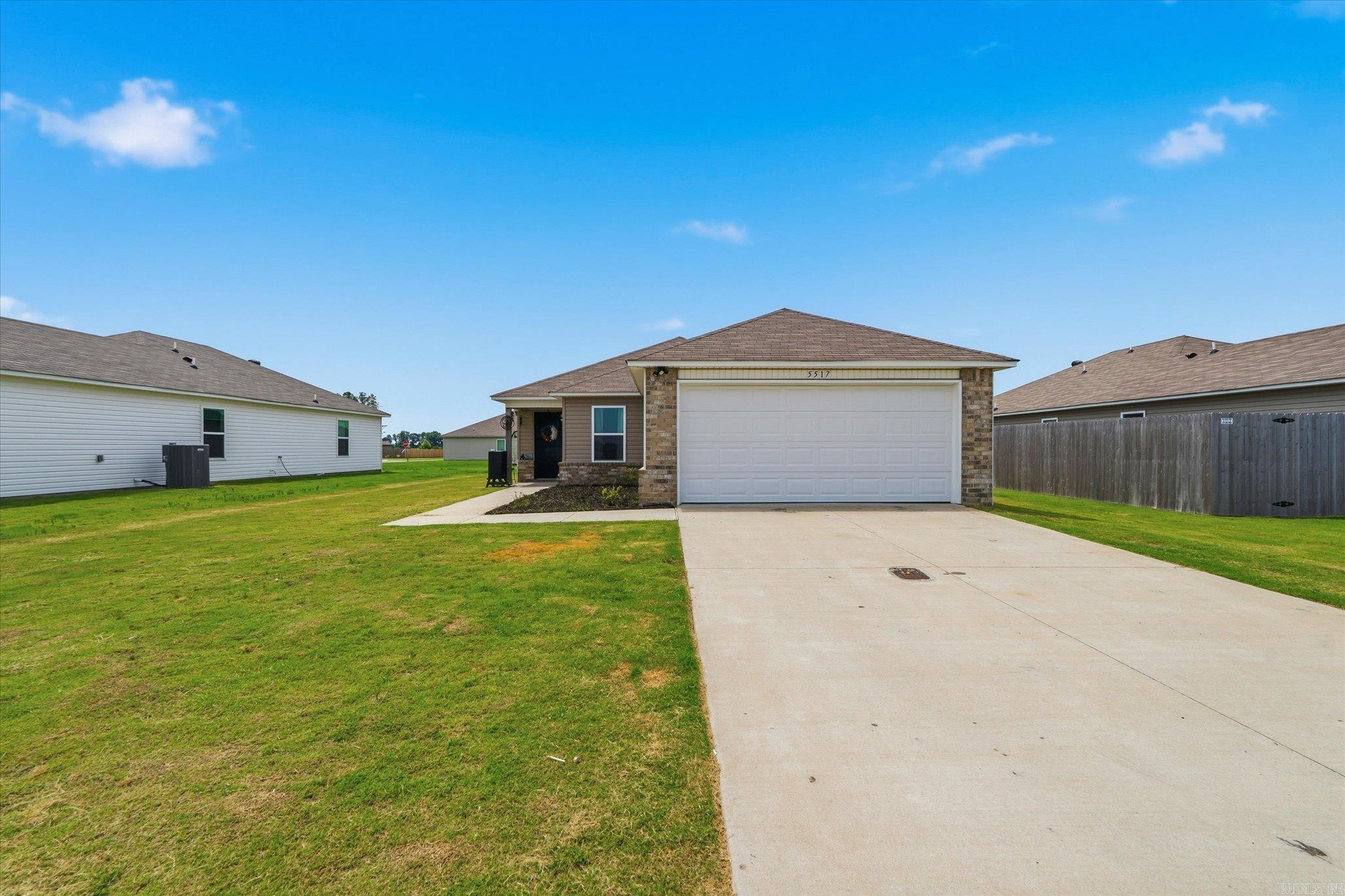 Introducing to the market 5517 Beech Grove located in the newly developed Pacific Grove Subdivision in Jonesboro, AR. Offering 3 bedrooms, 2 full bathrooms, and 1,301+/- sqft of thoughtfully designed living space, this 2023 built home combines modern comfort with everyday convenience. Step inside to an inviting open-concept layout featuring a spacious kitchen and dining combo that flows seamlessly into the living area - prefect for entertaining guests or enjoying quality time at home. The exterior showcases an attractive blend of brick and vinyl siding along with a two car garage for added functionality and curb appeal. Conveniently located near Arkansas State University, NEA Baptist Memorial Hospital, Municipal Airport, I-555 and some of the top retail and dining establishments that Jonesboro has to offer! Situated in the Brookland School District, this move in ready home offers the perfect combination of location, style, and value!