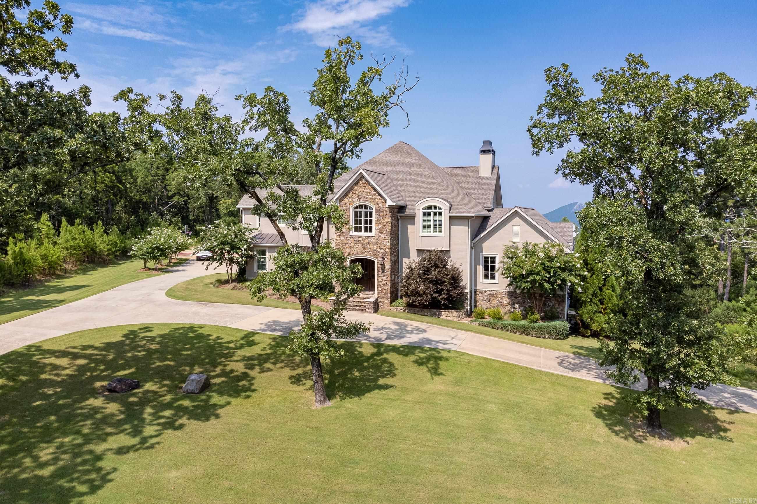 Stunning mountain views await in this gorgeous custom home on 5 acres! Beautiful finishes and soaring ceilings with wood beam accents thru-out. Vaulted Great RM showcasing impressive stone FP at one end and fabulous kitchen with top of the line appliances, informal dining & huge pantry at the other. Owner's suite is a relaxing retreat on main lvl as well as office, guest suite & laundry. Two guest suites up+5th BDRM, 1/2 BA & Theater room. Breathtaking pool, spa & pavilion ready for entertaining! Come See!