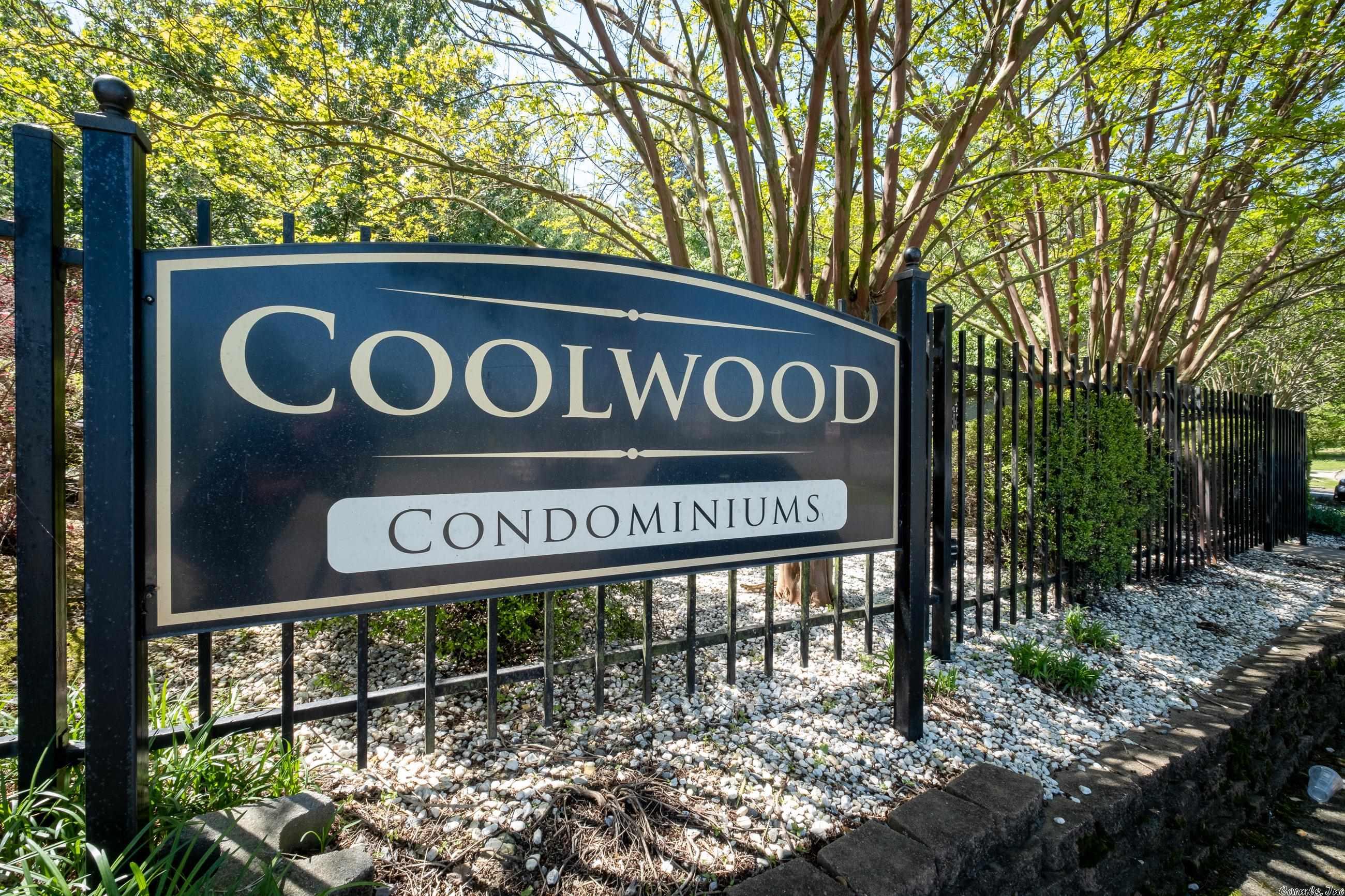 NEW LISTING in Riverdale!!    Precious looking, first floor, 2-bedroom condo which was updated in 2019 with new quartz countertops in kitchen has just been listed for sale!  All the wood floors are real wood, not laminate, and all appliances will convey at closing. Covered, assigned parking spot in gated parking area is a wonderful plus along with a porch/patio area that will look at the beautiful swimming pool as shown in the listing picture. Presently, the pool has been drained for new refurbishing and will be reopened this summer. Washer & dryer can be purchased but do not convey. Convenient location in a residential area are close to many restaurants and shopping spots in Riverdale. Walking and biking trails plus Rebsamen Golf course and movie theater are, also, located near to Coolwood.