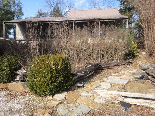 Cozy cabin with acreage and Shop with garage door. Open floor plan, vaulted ceiling. Split rail fence adds rustic touch. See attachment for PAS requirements & WFHM offer submital information in MLS document section. To report any concerns with a listing broker/agent or to report any property condition or other concern needing escalation, including concerns related to a previously submitted offer or information on how to place an offer, please call: 1-877-617-5274.