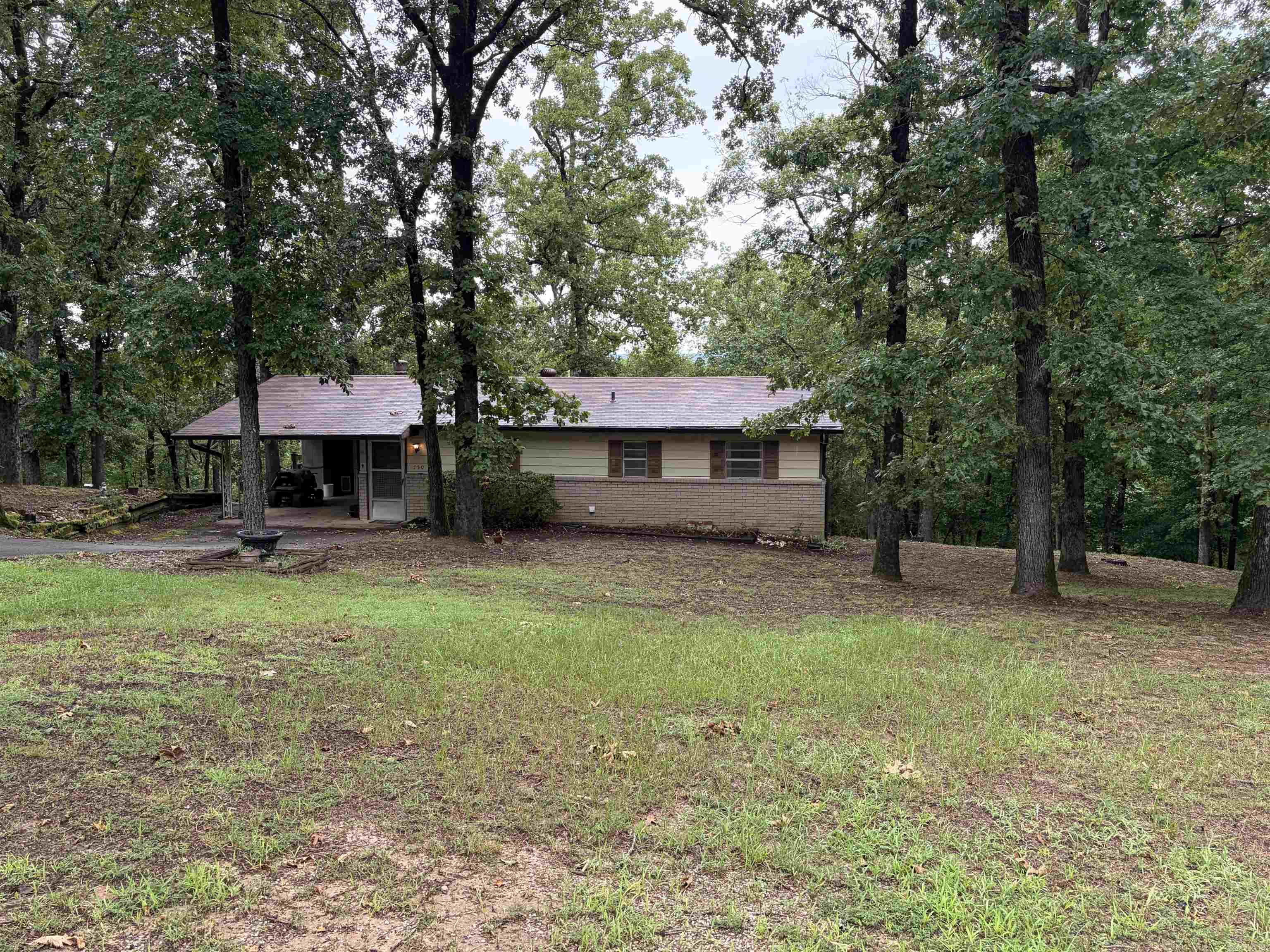 Escape to the peace and privacy of country living with this cozy 1976 ranch-style home situated on approximately 3+ beautiful partially wooded acres just outside the city limits. This 2-bedroom, 1-bath home offers a comfortable single-level layout with endless potential to make it your own.  Surrounded by mature trees, the property provides a serene setting with plenty of room to enjoy nature, garden, or simply relax in your own private retreat. Whether you’re looking for a full-time residence, a weekend getaway, or an investment opportunity, this property offers the perfect blend of rural tranquility and convenient access to nearby amenities. Hill Wheatley public beach and boat ramp is close by.  If you’ve been searching for an affordable home with acreage, privacy, and room to grow, this is one you won’t want to miss. Schedule your showing today and discover the possibilities this peaceful country property has to offer!