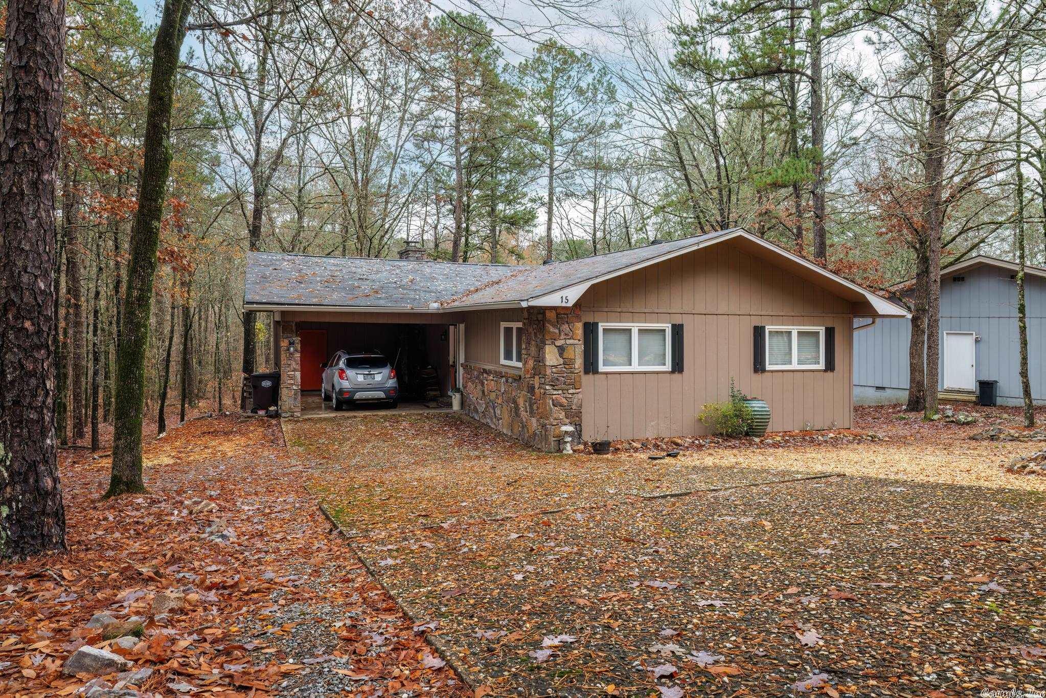 REMODELED. 2 bed 2 full bath w den, kitchen w new appliances, woodburning fireplace, small office, screened deck, etc.  Recently upgraded.     new paint, roof, water heater 2022, appliances 2018, etc.     Refrigerator, washer & dryer convey.       Screened deck.     Encapsulated crawl space w large storage space.     Beautiful natural wooded back.