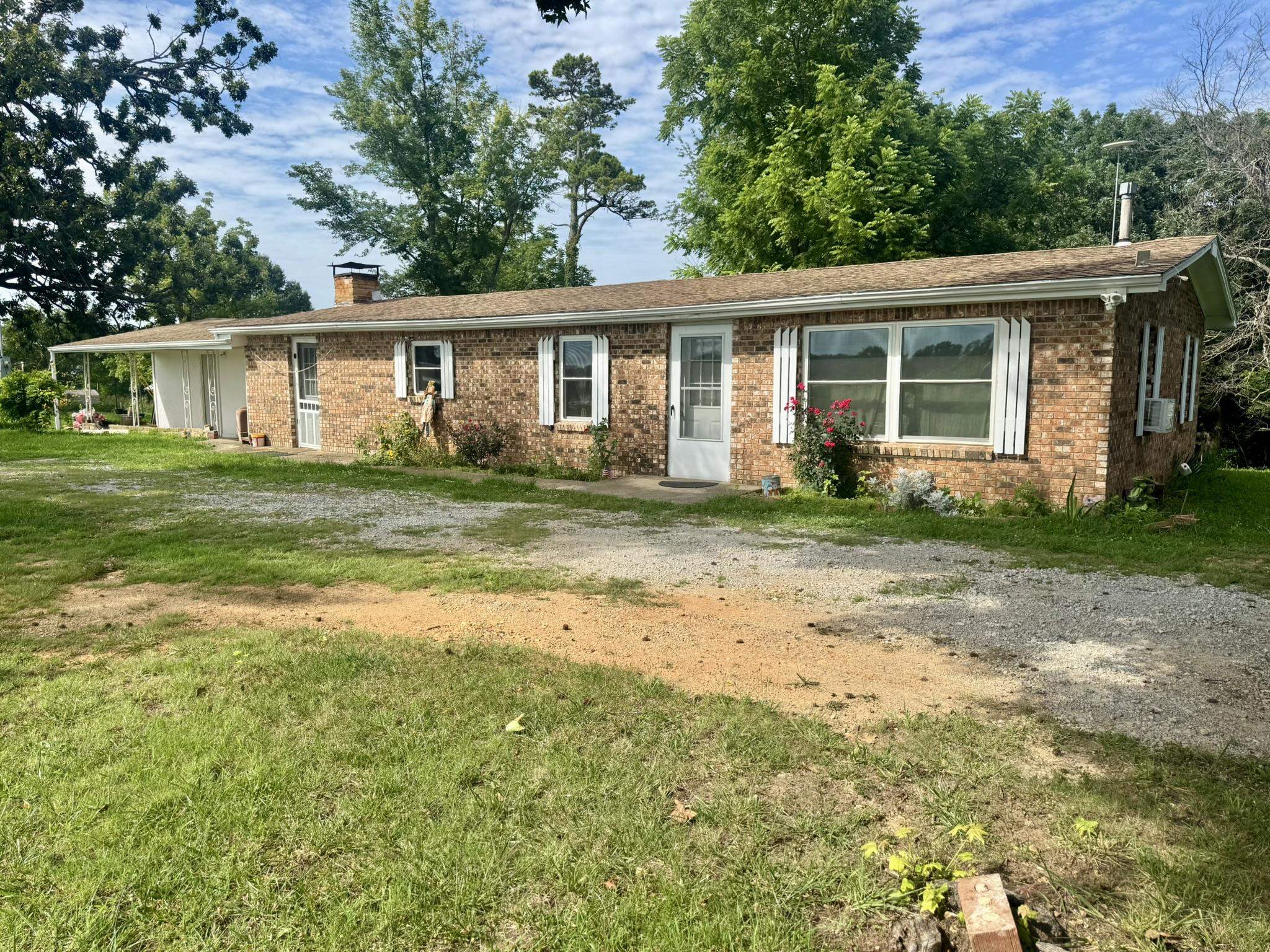 3 Bedroom Home with Acreage and Boat Storage Near Norfork Lake This 3-bedroom, 1.5-bathroom home is situated on approximately 1.43 acres with highway frontage and convenient access to Norfork Lake. Mature trees provide a natural setting, while the location offers quick access to boating, fishing, and other outdoor recreation in North Central Arkansas. The property includes an enclosed garage, a Quonset-style barn suitable for boat storage, equipment, or recreational vehicles, and a concrete storm shelter. The home is connected to city water and also includes a private well. With acreage, multiple storage options, highway access, and proximity to Norfork Lake, this property offers potential as a primary residence, weekend retreat, or vacation rental. Offered at $129,900.