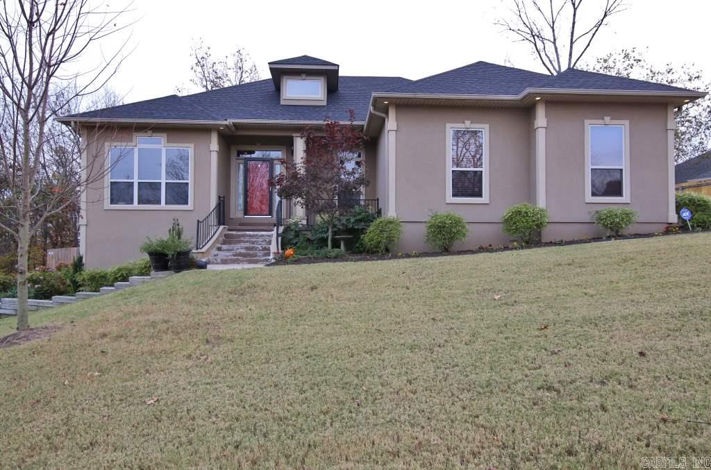 Beautiful home on quiet street w/ side load garage & great views! Lovely greatroom w/ hdwds, fireplace & built-ins. Kitchen has lots of cabinets, tile floors & large pantry, dining area is spacious w/ room for all the family & door to covered back deck. Master apart w/ trey ceilings, big walk-in closet, bathroom w/ double sink vanity, tub,  separate shower & steps away from laundry room! Relax on the covered front porch or private back yard w/ extra landscaping. Walk-in under house storage w/ cement floor!