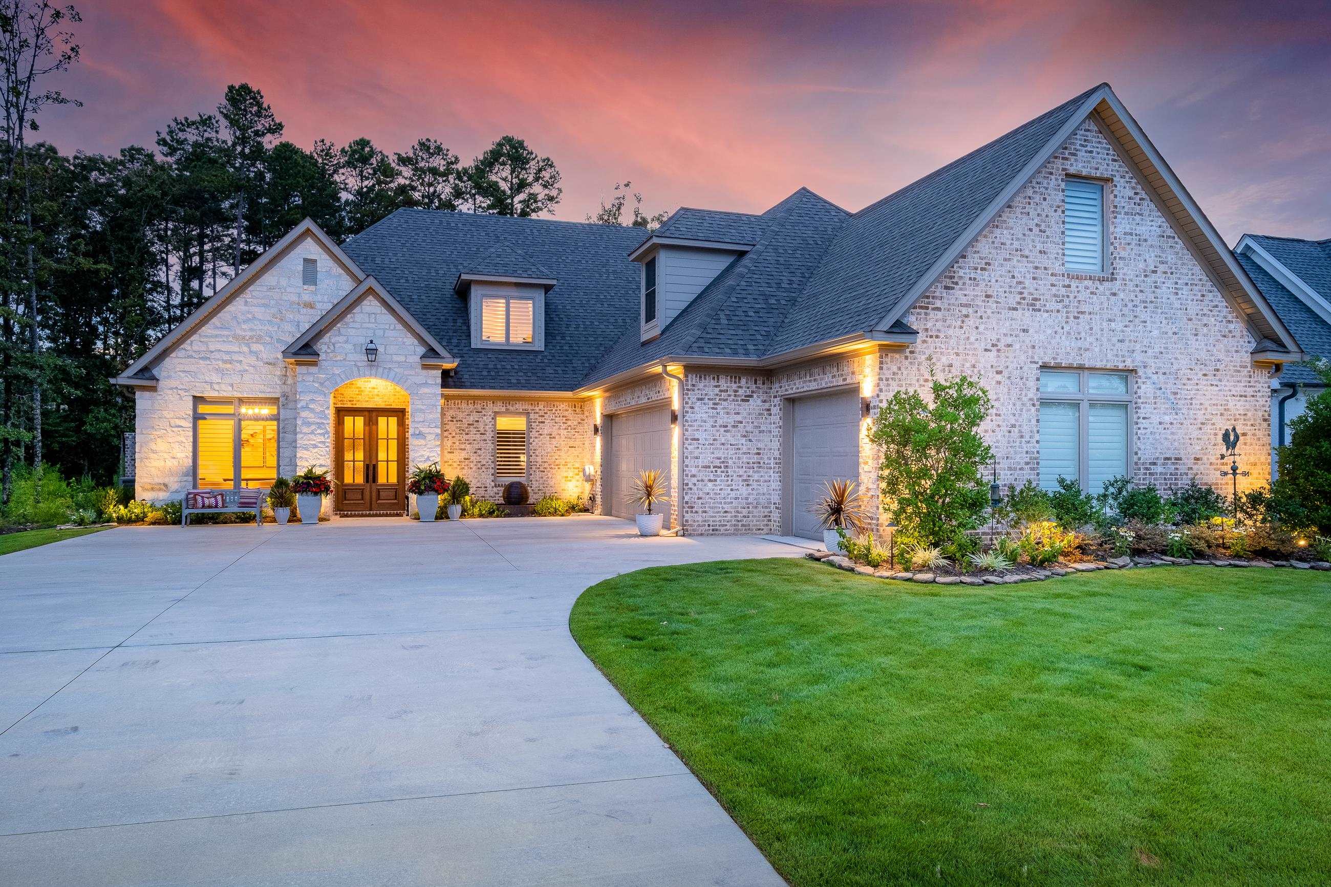 Stunning better than NEW custom home by Randy James Construction in the gated community of Hallen Ct. Gorgeous hickory floors lead into a light filled open floorplan, glass doors that open to the most gorgeous outdoor living space with kitch, fireplace and travertine pool/spa and greenspace for lots of privacy.   4 bed, 3 1/2 baths plus family room and office, with 2 bedrooms on the main.  Chef's kitchen, gorgeous finishes and lighting,gorgeous master suite with huge master bath, his/hers closets.COME SEE!!