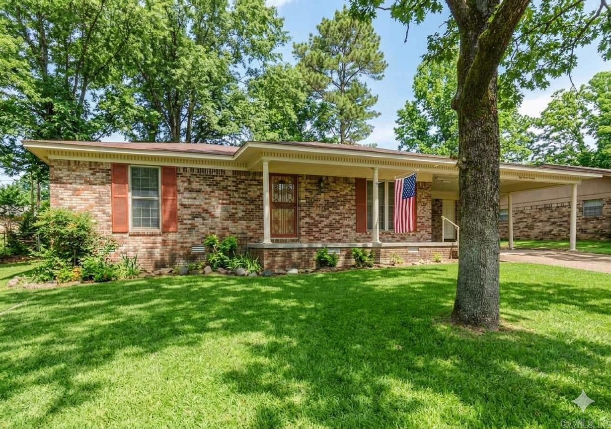Welcome home! This 1,897-square-foot gem is a loving family's dream canvas. Gather around the charming wood-burning fireplace in the family room, or soak up the natural light in the beautiful sunroom. Step outside to a sprawling, level backyard that is the perfect stage for lazy Sunday mornings and vibrant summer barbecues. Make this your own and settle in for years of happy memories.  Conveniently located close to shopping, schools and so much more.  Some photos have been AI edited to show potential
