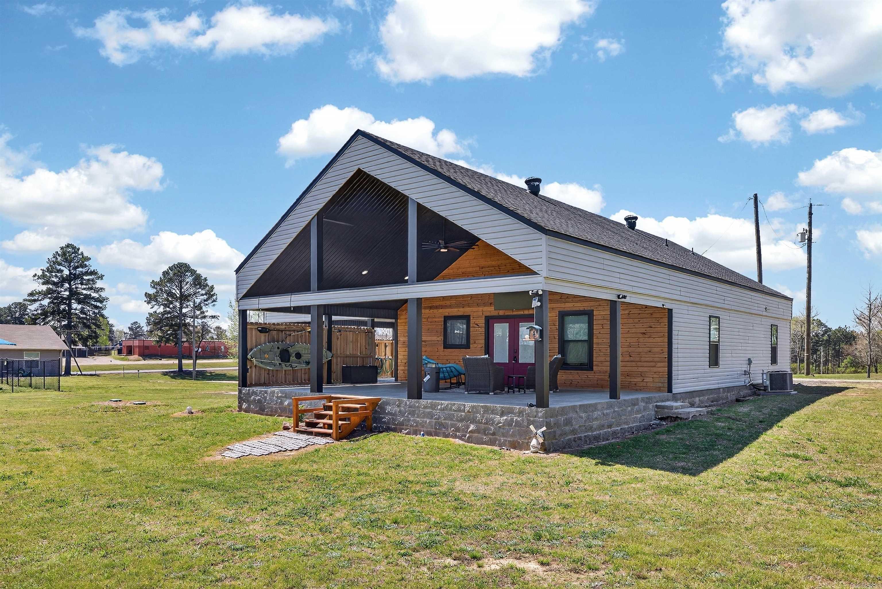 Looking for a peaceful place to call home with room to relax, unwind, and enjoy the outdoors? This beautiful property offers the perfect combination of privacy, acreage, and modern comfort.  2 Bedrooms, 2 Bathrooms, 4.57 Acres, private stocked pond, huge loft area, built in 2022, move-in ready.  Seller is offering $6,500 toward the buyer’s closing costs, making this incredible property even more affordable!  Imagine starting your mornings with coffee on the porch overlooking the pond, spending evenings fishing at sunset, and enjoying the quiet beauty of country living.  With plenty of space both inside and out, this property offers endless opportunities to enjoy nature, entertain guests, or simply escape the hustle and bustle of everyday life.  Don’t miss your chance to own this little slice of Arkansas paradise. Schedule your private showing!