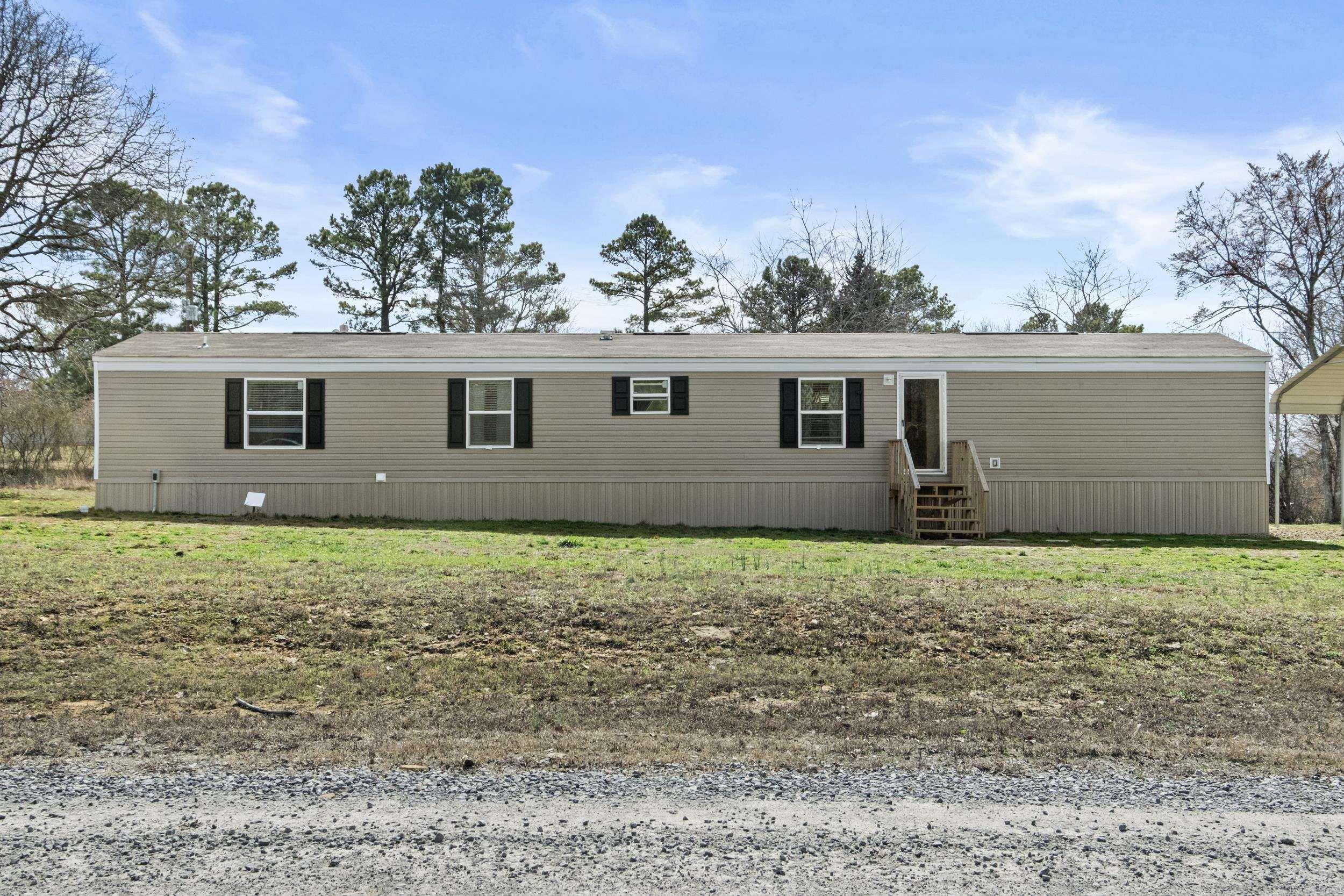 Welcome to peaceful country living! This 2024 single wide home offers 3 bedrooms, 2 full baths, and a flex room that can be utilized as an office or separate dining room. Situated on 3.14 acres in a quiet rural setting, you'll enjoy space, serenity, and room to grow. Perfect opportunity for a first-time home buyer or anyone looking to downsize without sacrificing comfort. Best of all - this home is being sold Furnished, making it truly move-in ready! Just bring your clothes and settle right in! This mobile is on a permanent foundation. Call today for more information and to schedule your private showing.