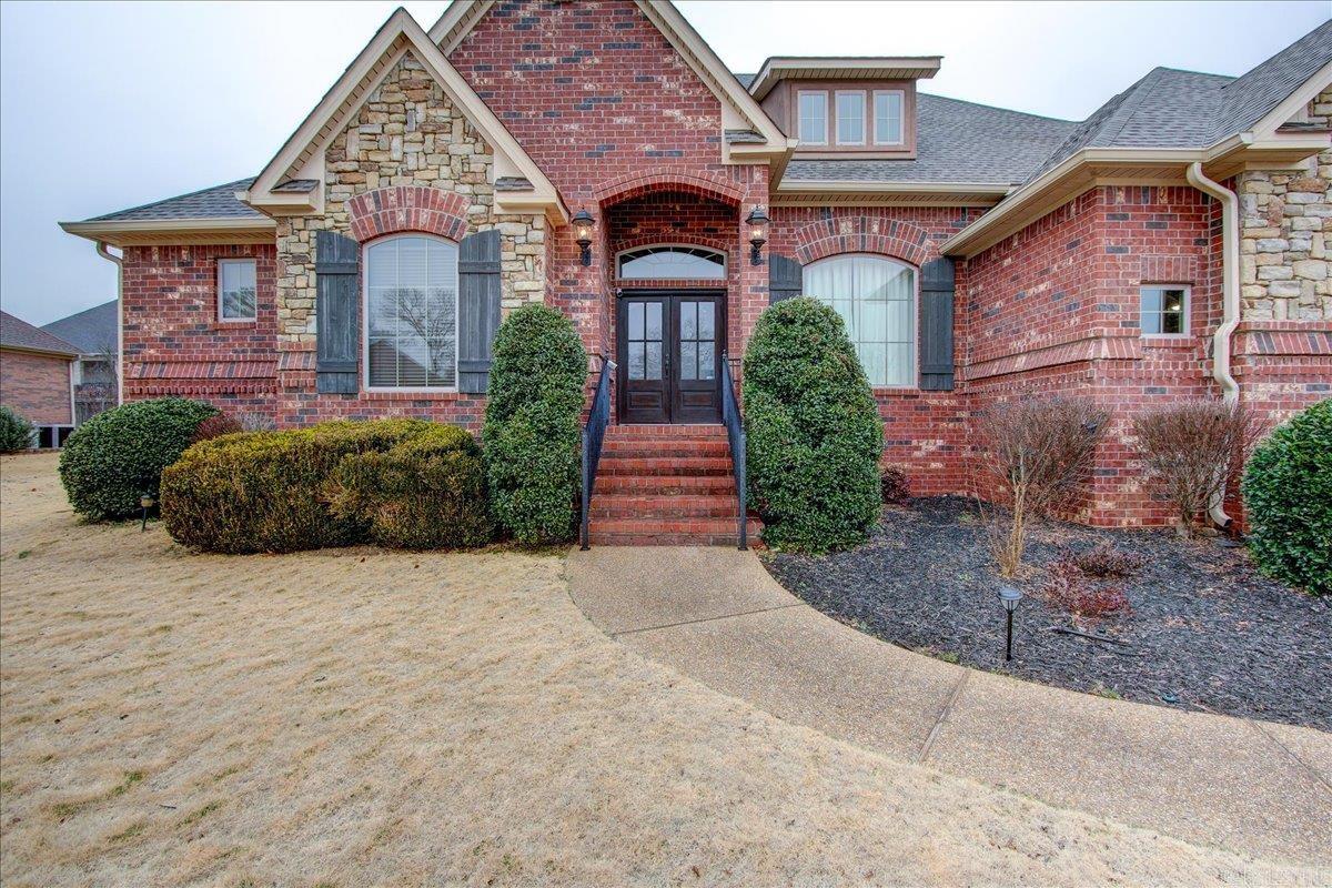 Stunning 4BR, 2.5BA brick home with Lake Hamilton access in the gated Westwinds subdivision. Located in the sought-after Lake Hamilton School District, this home is move-in ready with high ceilings, crown molding, and granite countertops. Enjoy the cozy fireplace, spacious primary bedroom, and two guest rooms on the first floor, with a fourth bedroom upstairs. The fenced backyard and 3-car garage add to the appeal. Minutes away from Lake Hamilton, shopping, Oaklawn Racing & Casino, and Downtown Hot Springs.
