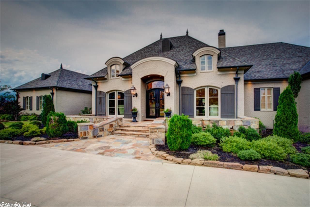 Stunning home w/ all the extras! Beautifully located on 16 acres w/ spectacular views of Pinnacle Mtn.One level home w/ elegant, well-porportioned RMS, covered veranda overlooking inground 20x40 salt water pool, heated & cooled kids playhouse,zip line, & sand volleyball CT. Home also features craft & exercise RMS.Gourmet KIT w/ all the bells & whistles!Luxurious, light-filled MST suite complete w/ spacious walk-in closet, jetted tub, & custom shower.2 laundry rms. NEW 2014 - detached, 3 bay garage/workshop!