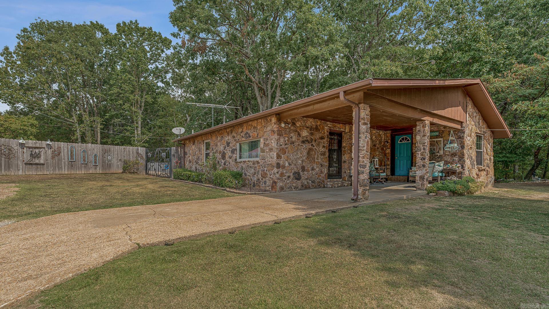3 +/- acres on beautiful Crowley's Ridge featuring a charming home and an in-ground swimming pool just outside Harrisburg! Located at 8348 Arva Ln, this property offers a peaceful ridge-top setting with mature trees, wildlife, and room to spread out. Enjoy summers by your private in-ground pool and plenty of space for gardening, play, or future improvements. Conveniently located only minutes from town, this is a great opportunity for anyone wanting country living with a recreational backyard oasis on the Ridge.