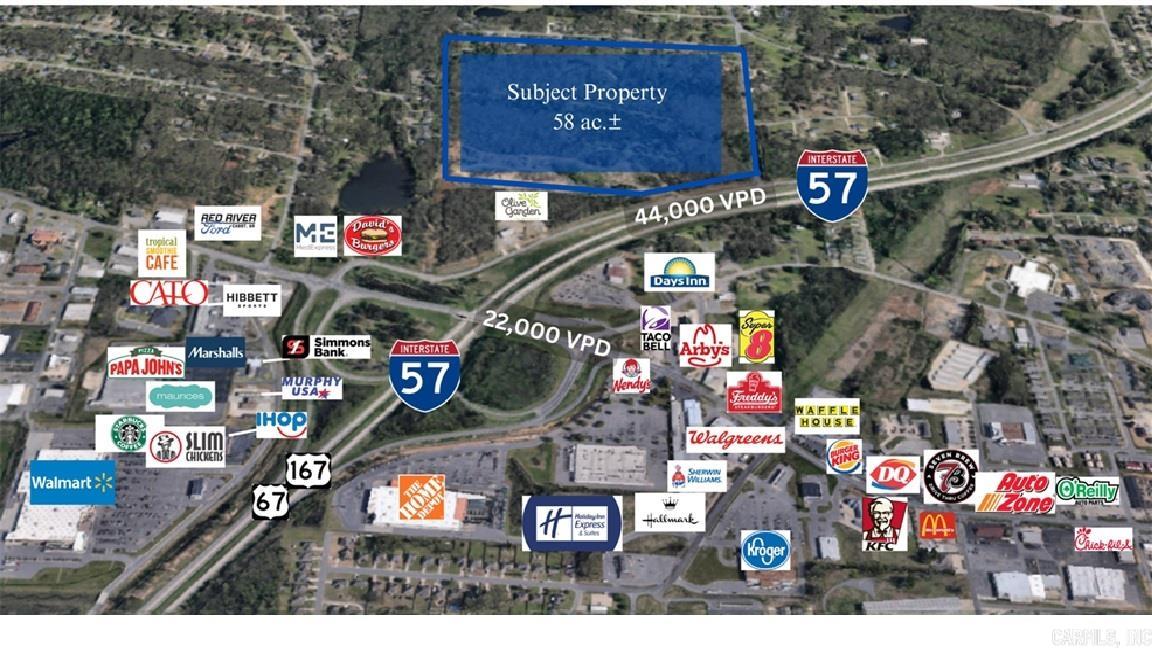 RARE OPPORTUNITY!  57.8 acres with high visibility and Interstate 57 frontage (formerly Hwy 67/167).  This development opportunity is in an area of explosive community & commercial growth, adjacent to the newly constructed Olive Garden.  With an estimated daily traffic count of 44,000, this property is ready for a Planned Development (commercial/mixed-use), big box retail shopping, and anything in between.  City utilities available. Currently Zoned R-1 but should easily be rezoned based on proposed use.