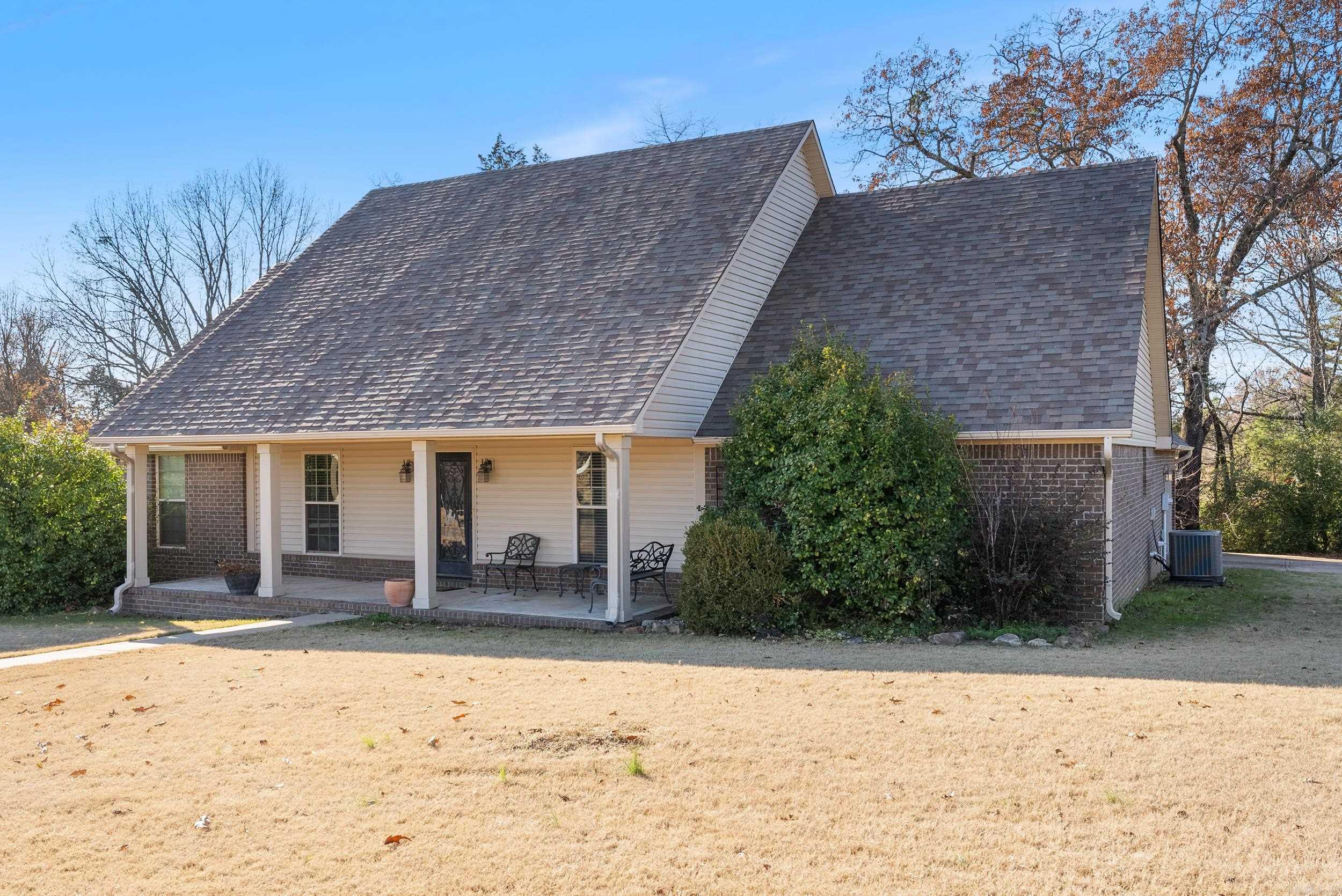 This home sits on almost an acre with mature trees which affords great privacy on the deck and a huge covered front porch.  Laundry is 12 X 11. The laundry room can double as a hobby room or an extra area for a pantry.  A bonus room provides flexibility for a home office, playroom, or additional living space. Recent updates include a brand-new roof and HVAC system, both installed in 2024, ensuring peace of mind for years to come.  The outdoor space is a true highlight with the large lot, Located in the heart of Greenbrier. Don't miss your chance to see this beautiful property—schedule your showing today!
