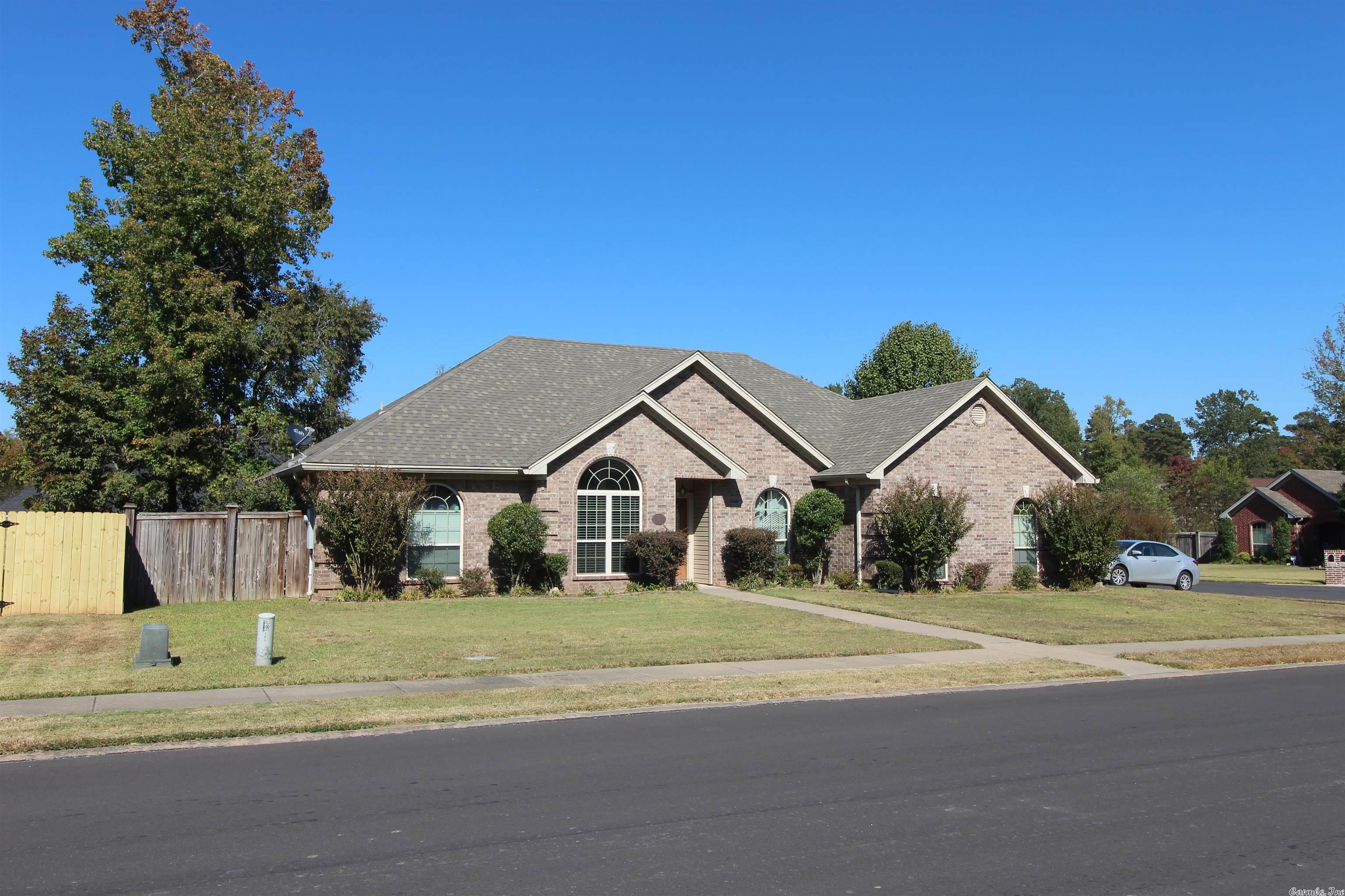 Super nice, beautifully  well constructed, brick home.  3 bedroom, 2 bath, master separate, super nice master bathroom with jetted tub and walk-in shower, large walk-in closets, almost new electric fireplace, fully fenced back yard and a huge 16 x 30 covered back porch.  All this on a quiet corner lot.  HVAC  2 years old, roof 5 years old, fireplace 2 years old.  Really an awesome house.  Must see to appreciate.  Close to Golfing, Tennis, swimming pool and more.  Only $131 a sq ft.  Well below market value!