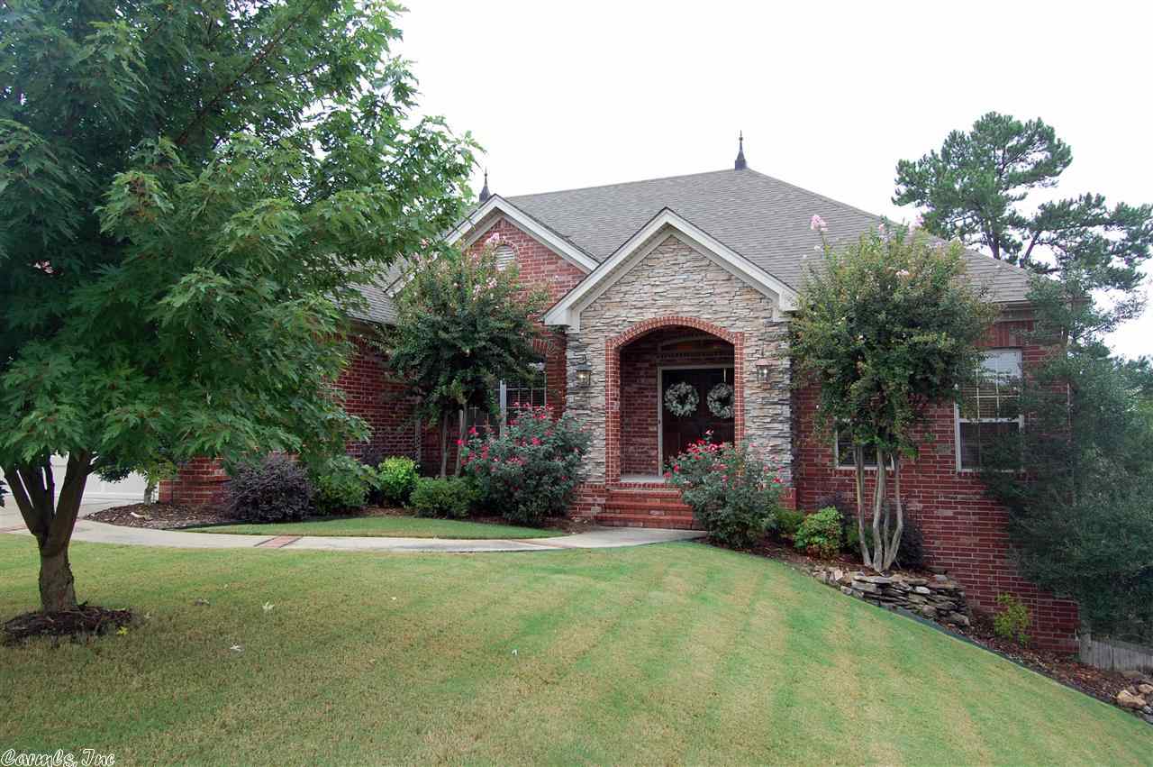 Custom built 4 bedroom/3 bath home on cul-de-sac w/ greenbelt behind!  Gracious master bedroom is on the main level & features a spa bath & walk-in closet. There is also a 2nd bedroom & full bath on the main level, plus laundry room. The kitchen features granite countertops, island, lots of handsome cabinetry & is open to a breakfast area w/ a see through fireplace shared w/ the great room. Downstairs are 2 more bedrooms, full bath, playroom & office. Screened porch, deck & backyard. See agent Remarks.