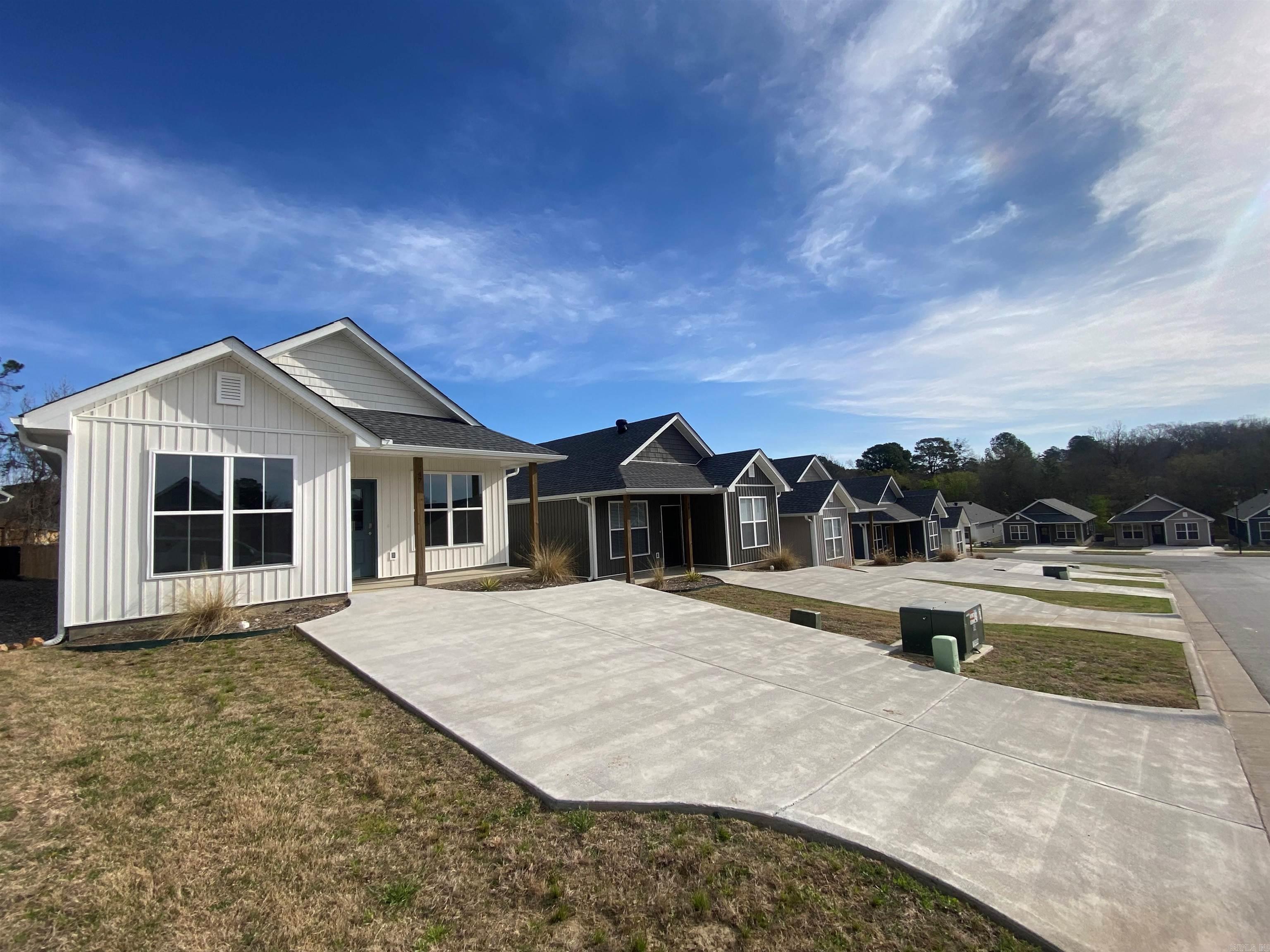 Don't miss this exceptional chance to build a lucrative rental portfolio in a thriving community! 5 homes in a row, maximizing efficiency in property management. Offered significantly below current market value, ensuring excellent ROI.  Each property presents a turnkey investment with high tenant appeal.  A 1-year builder's warranty included for added peace of mind!  HOA handles all front and back yard maintenance, eliminating landscaping hassles.  This subdivision has a proven rental market with comparable homes currently renting for $1900+ per month, demonstrating strong rental demand.  Vibrant neighborhood with a dedicated pickleball court, dog park and manicured green space area.  A rare opportunity to offer a “Class A”, BRAND NEW housing option located in the heart of Little Rock, offering convenient access to shopping, dining, entertainment and major employers.  Perfectly positioned between Interstates 430 and 630 making highway access effortless!  Seller paying up to $10k in closing costs!  *Furnished photos are of the model home in the subdivision*