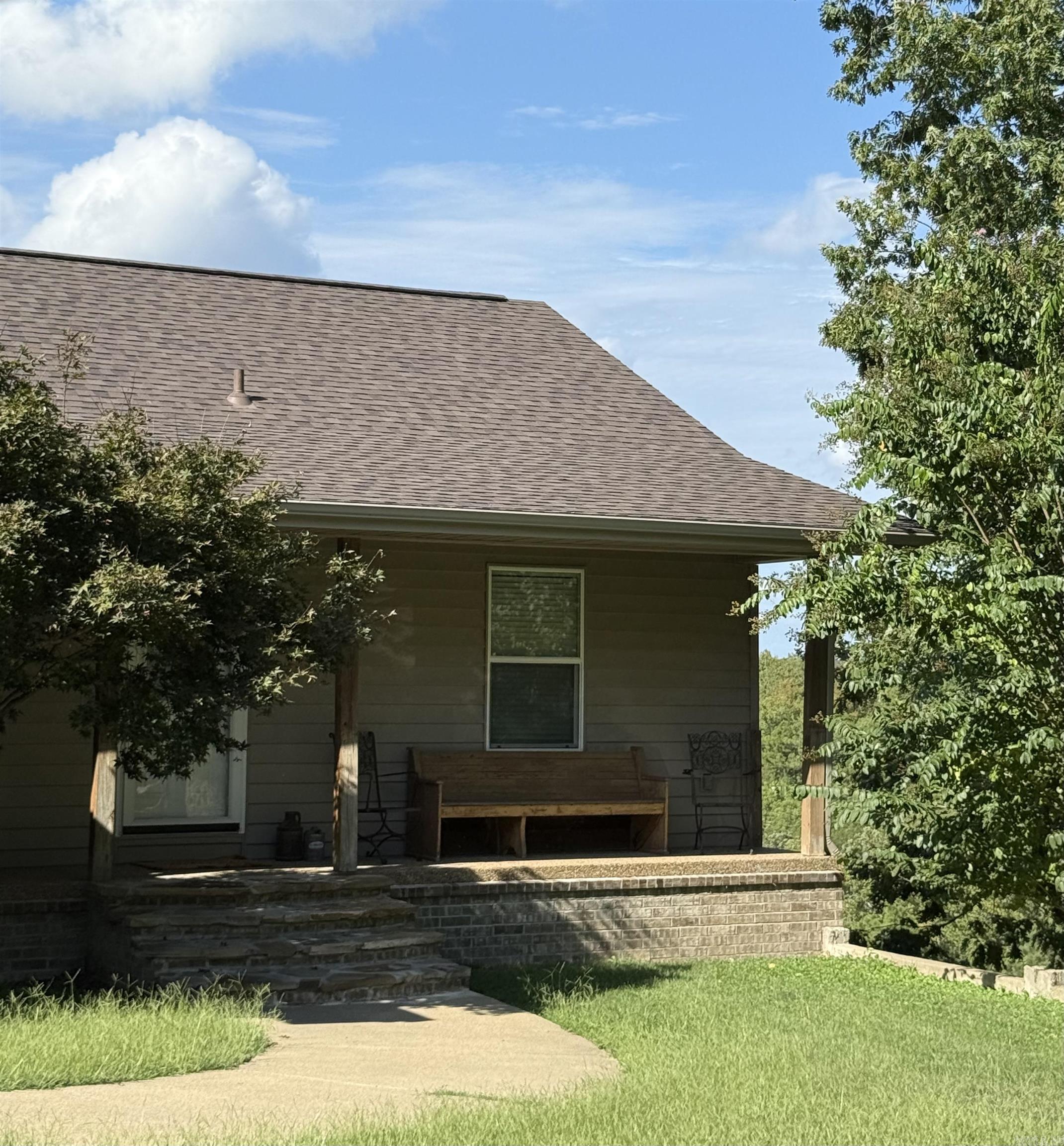 3 Bdrm, 3 Ba Home in Royal, AR – Adventure, Space & Serenity combined! Welcome to a home and 14 acres in the heart of Royal, AR-a rare property offering the perfect blend of outdoor adventure, comfort, and million-dollar views. Nestled in a peaceful ATV-friendly community, this home is surrounded by nature’s best and just minutes from Lake Ouachita, Lake Hamilton, Hot Springs, and Lake Hamilton School District. Step inside to find 3 spacious bedrooms and 3 full baths, beautifully designed for both comfort and functionality. The home’s layout makes entertaining easy, with open living areas that flow seamlessly toward panoramic views of the rolling landscape. Downstairs, the lower level offers endless possibilities — wet bar and a perfect area a for billiards table. Outside, the property is truly a paradise for outdoor enthusiasts. Enjoy year-round water access complete with a beautiful natural swimming hole, explore trails by ATV, or take advantage of your own private shooting range. This is also trophy deer country — a hunter’s dream right in your backyard. For hobbyists and craftsmen, the insulated shop w/ water and electricity offers plenty of space for projects.